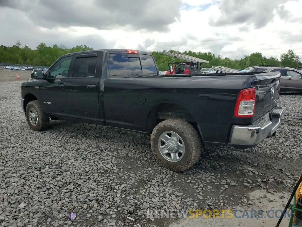 2 Photograph of a damaged car 3C6UR5HJXMG632935 RAM 2500 2021