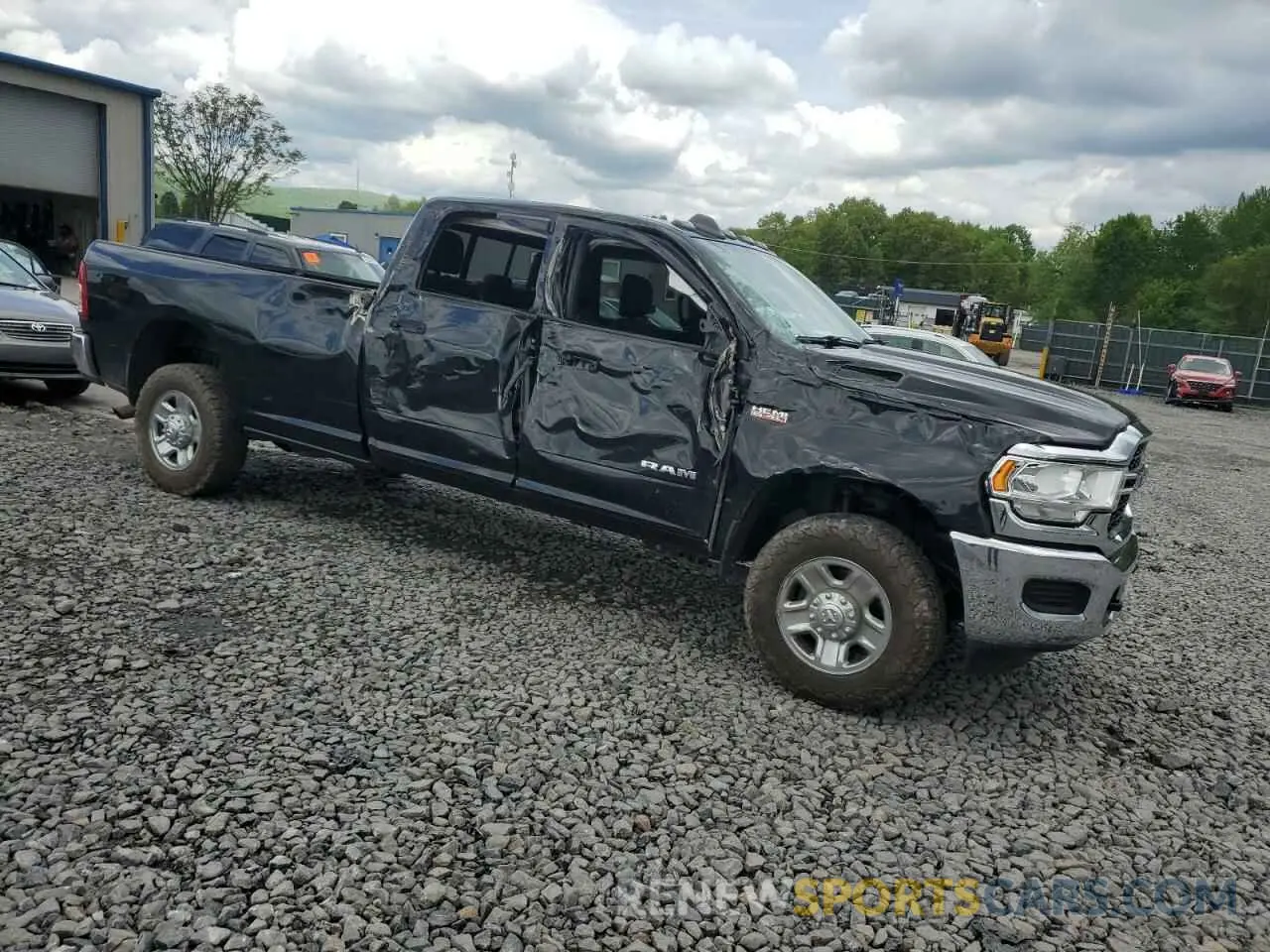 4 Photograph of a damaged car 3C6UR5HJXMG632935 RAM 2500 2021