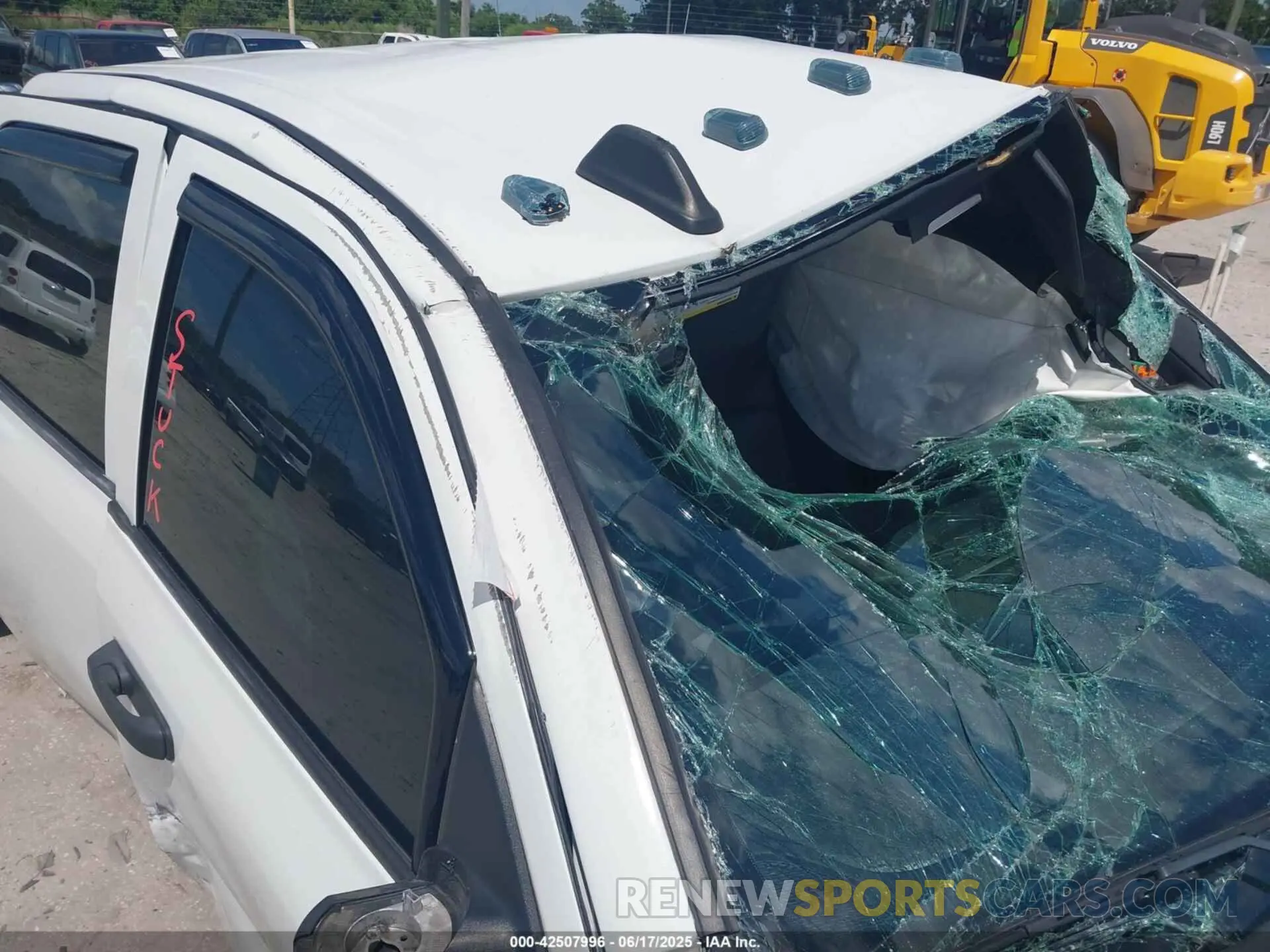 12 Photograph of a damaged car 3C6UR5HL3MG650257 RAM 2500 2021