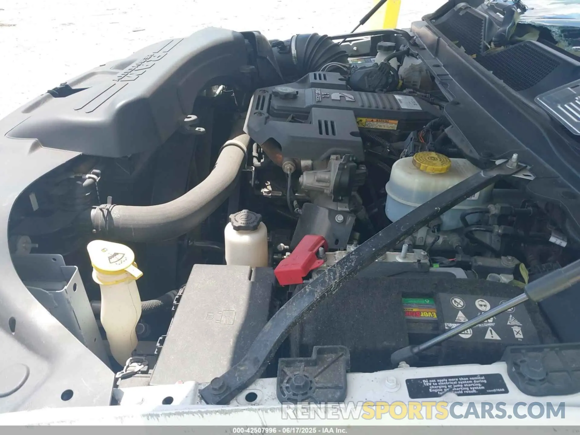 14 Photograph of a damaged car 3C6UR5HL3MG650257 RAM 2500 2021