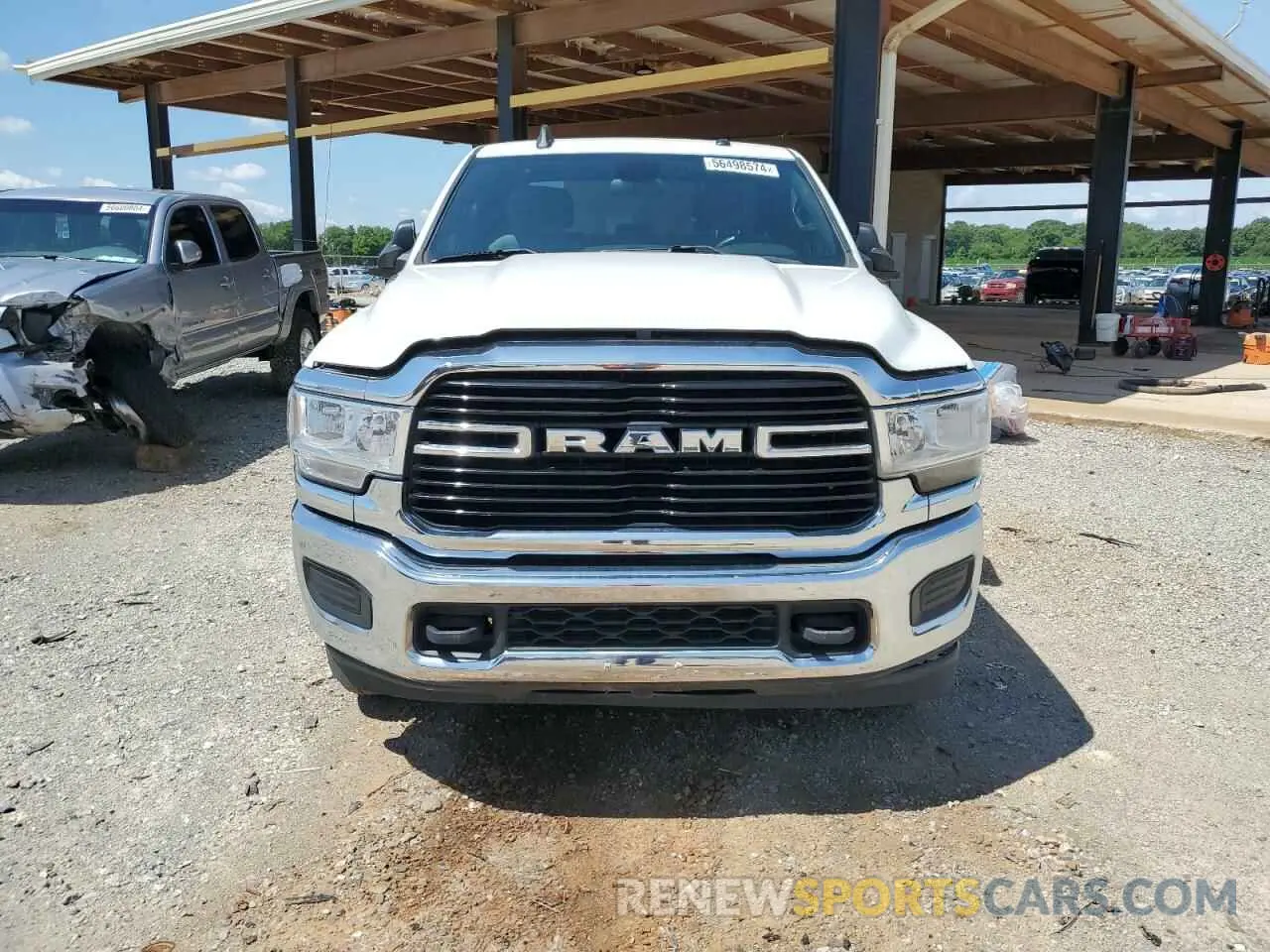 5 Photograph of a damaged car 3C6UR5JL0MG542107 RAM 2500 2021