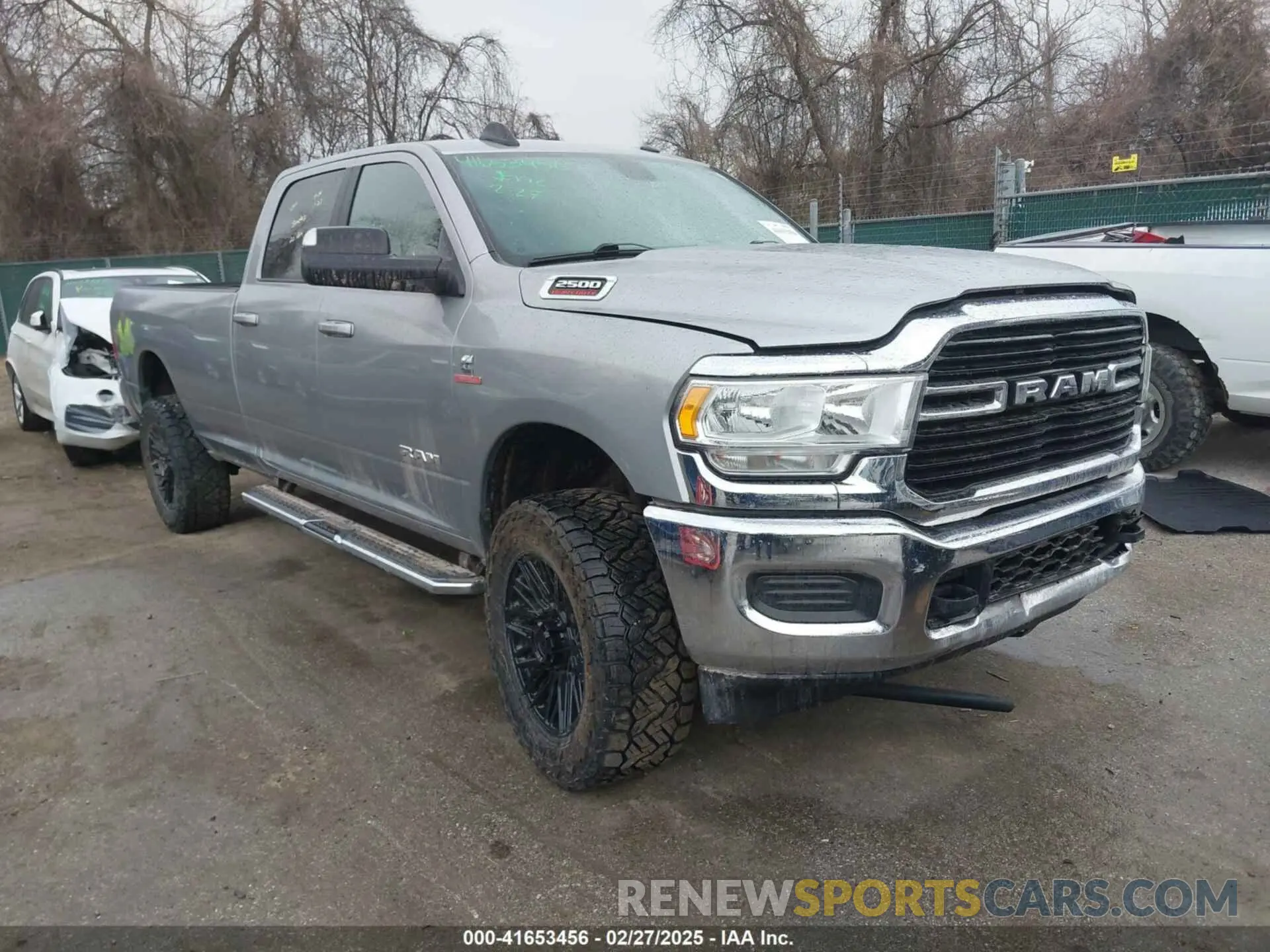 1 Photograph of a damaged car 3C6UR5JL4MG653548 RAM 2500 2021