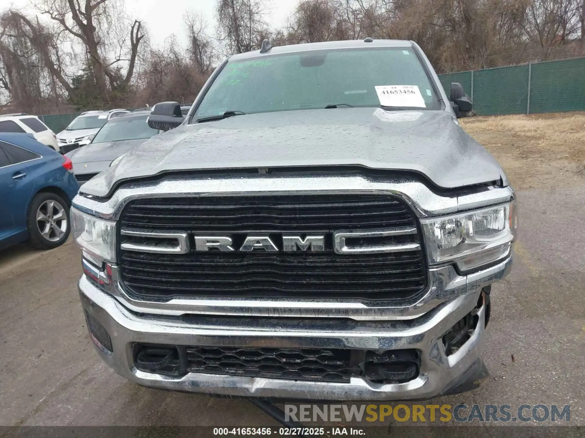 13 Photograph of a damaged car 3C6UR5JL4MG653548 RAM 2500 2021