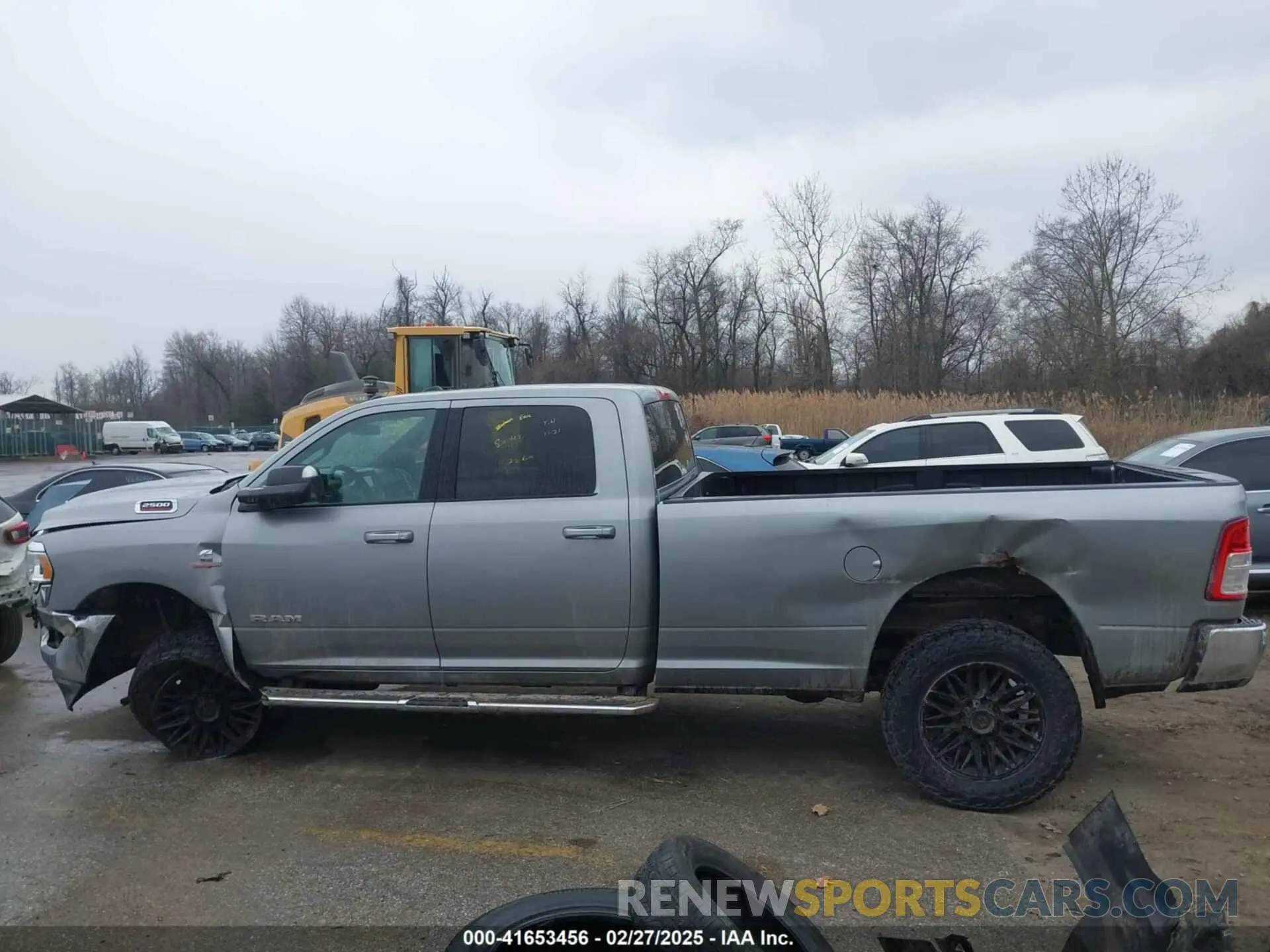 15 Photograph of a damaged car 3C6UR5JL4MG653548 RAM 2500 2021