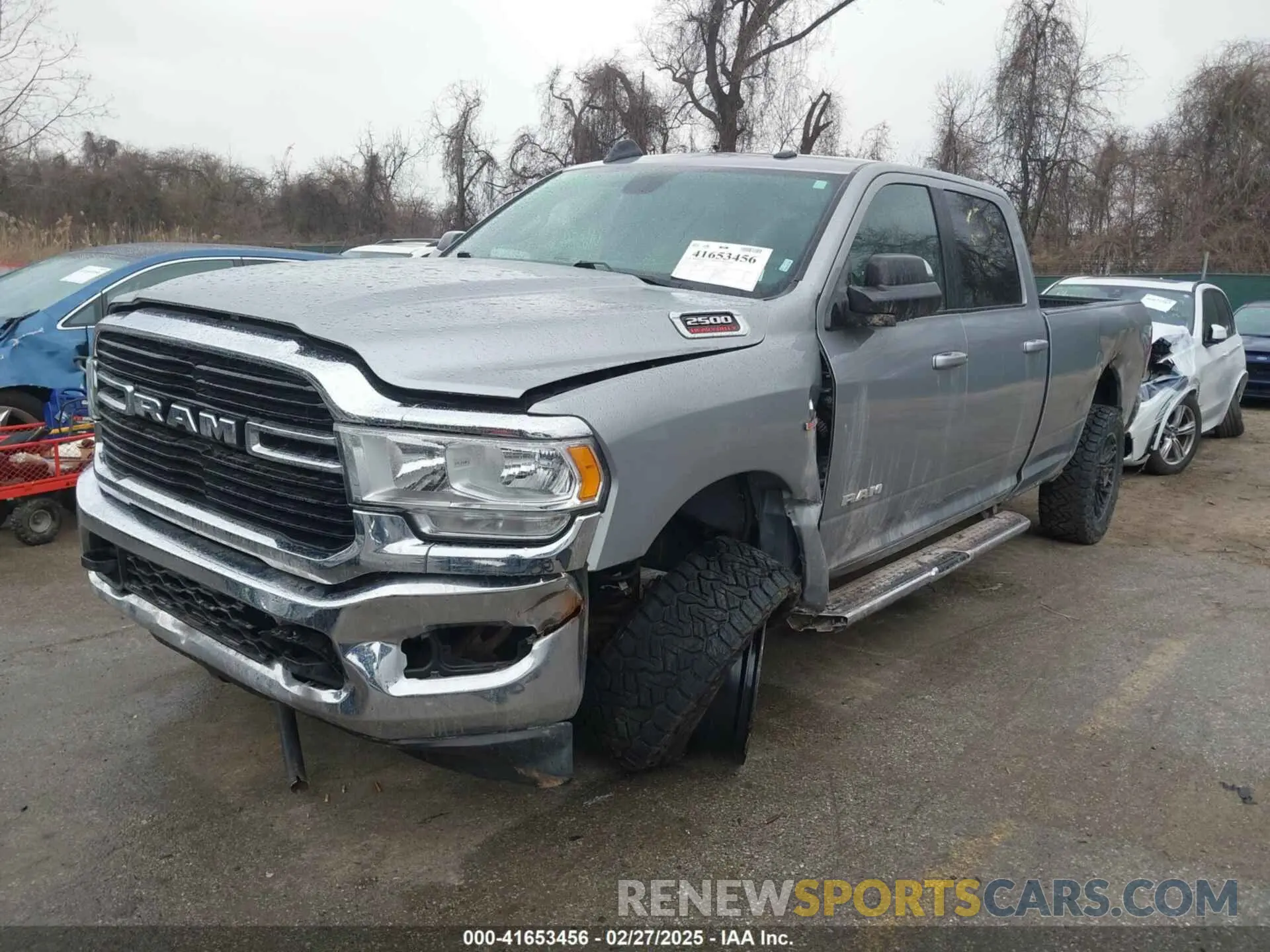 2 Photograph of a damaged car 3C6UR5JL4MG653548 RAM 2500 2021
