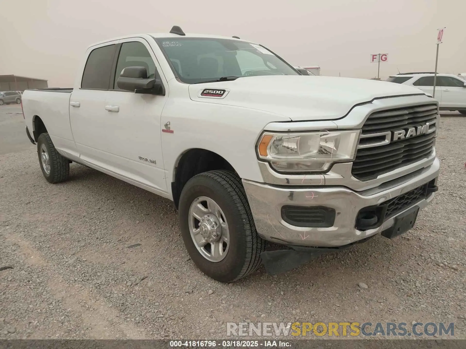 1 Photograph of a damaged car 3C6UR5JLXMG542406 RAM 2500 2021
