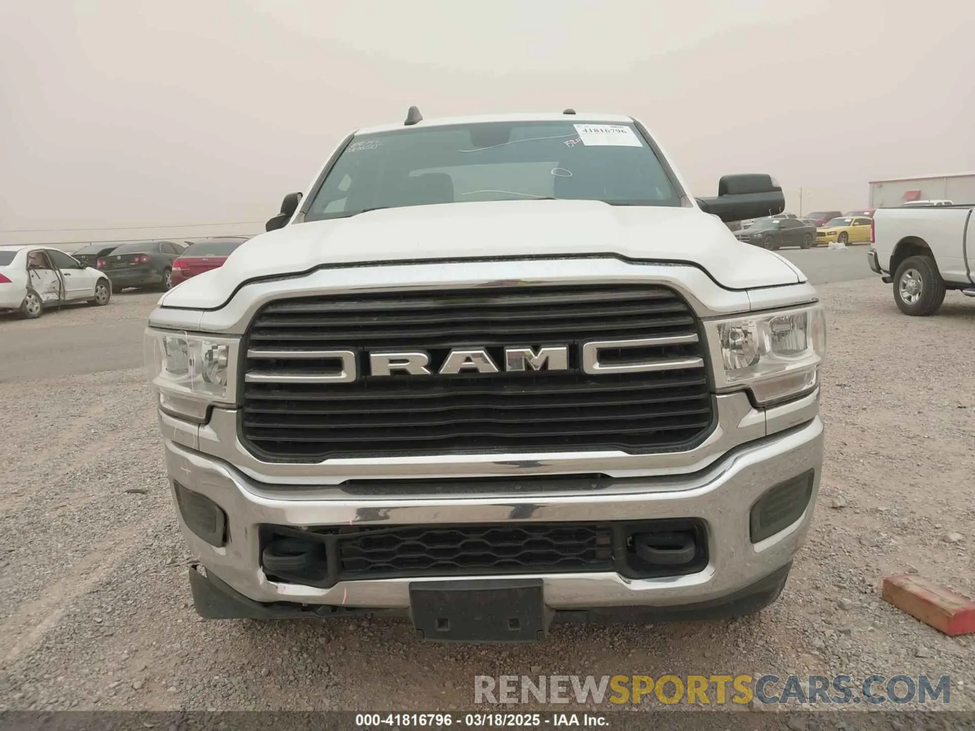 12 Photograph of a damaged car 3C6UR5JLXMG542406 RAM 2500 2021