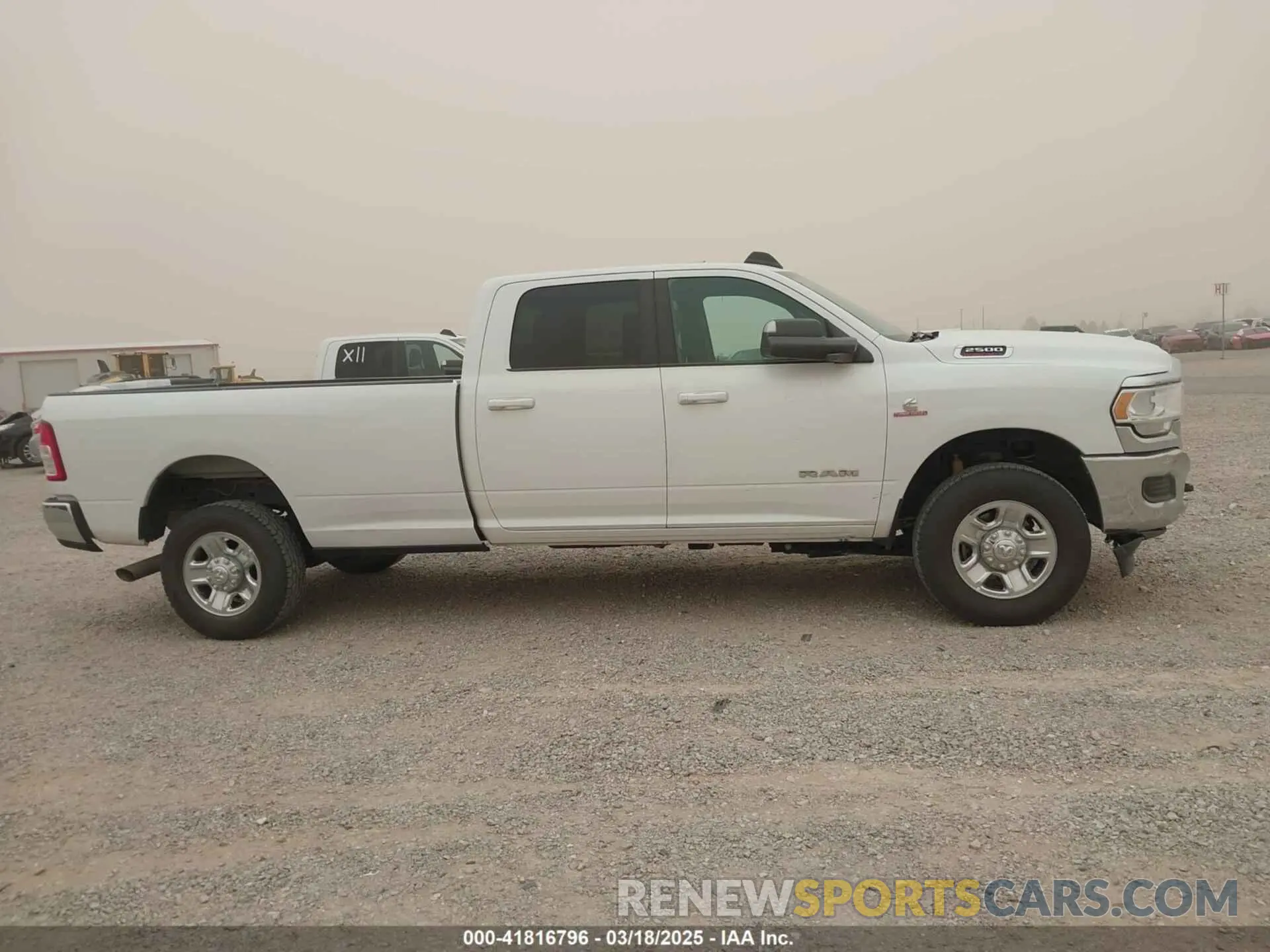 13 Photograph of a damaged car 3C6UR5JLXMG542406 RAM 2500 2021