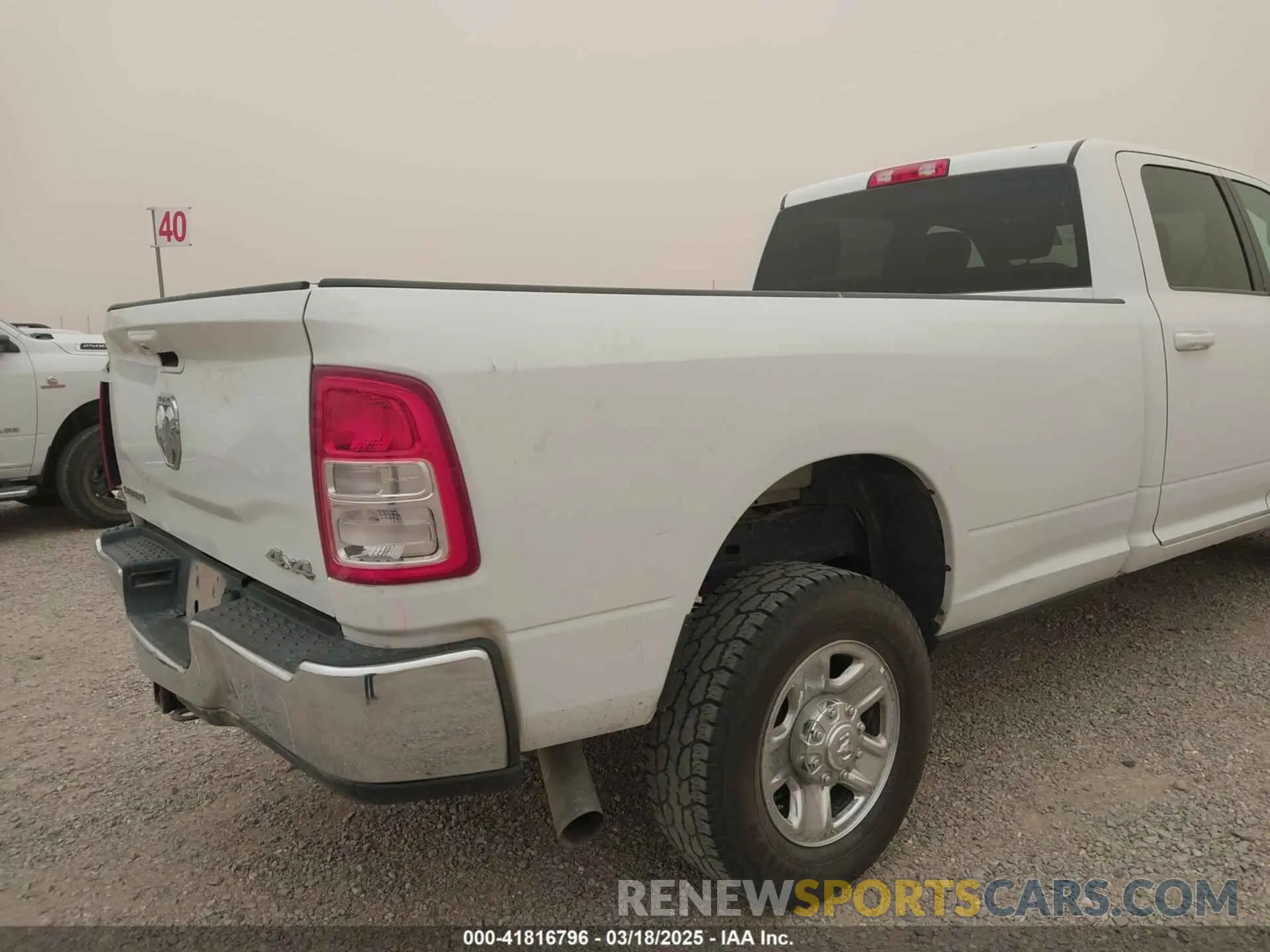 18 Photograph of a damaged car 3C6UR5JLXMG542406 RAM 2500 2021