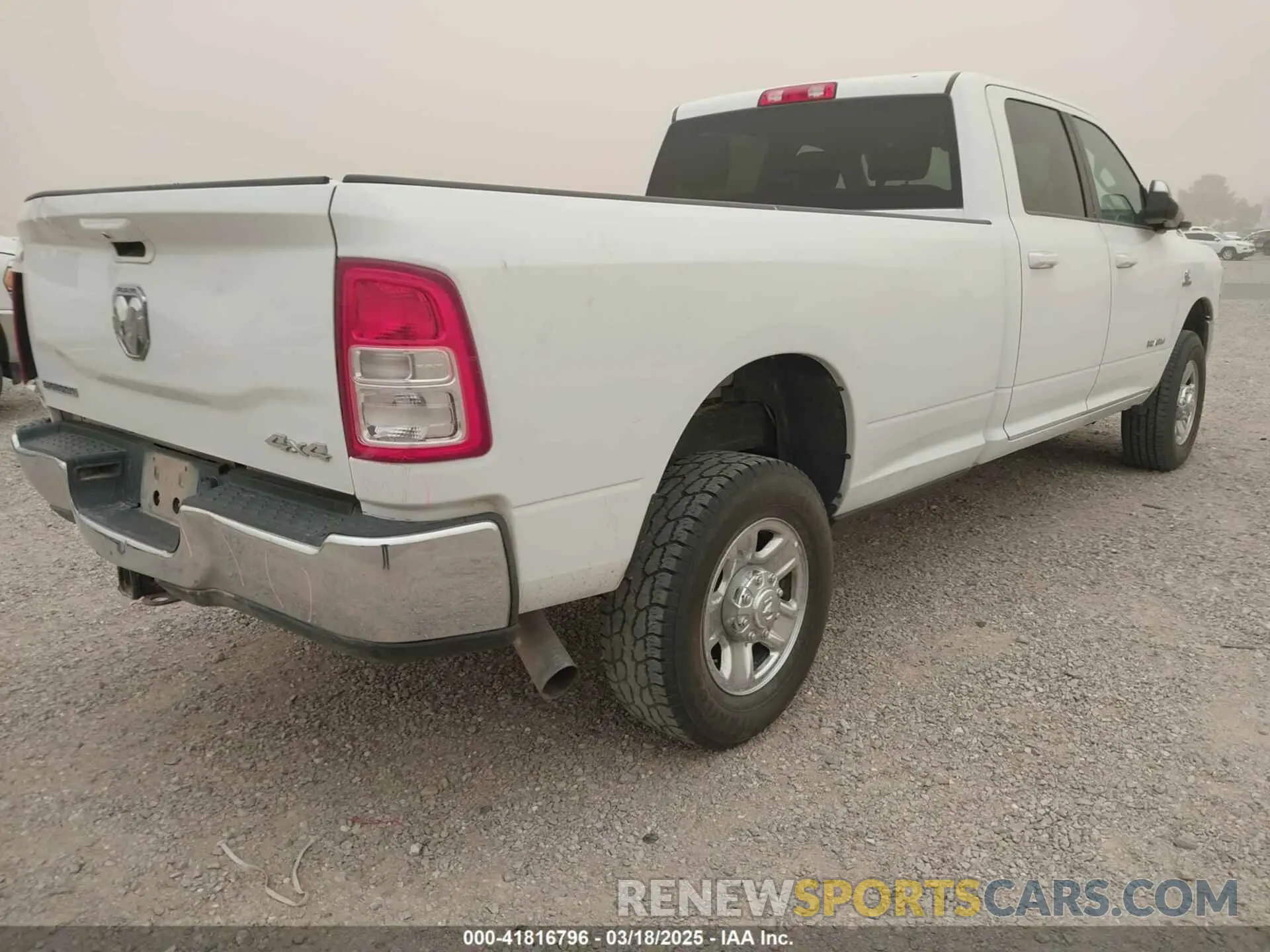 4 Photograph of a damaged car 3C6UR5JLXMG542406 RAM 2500 2021