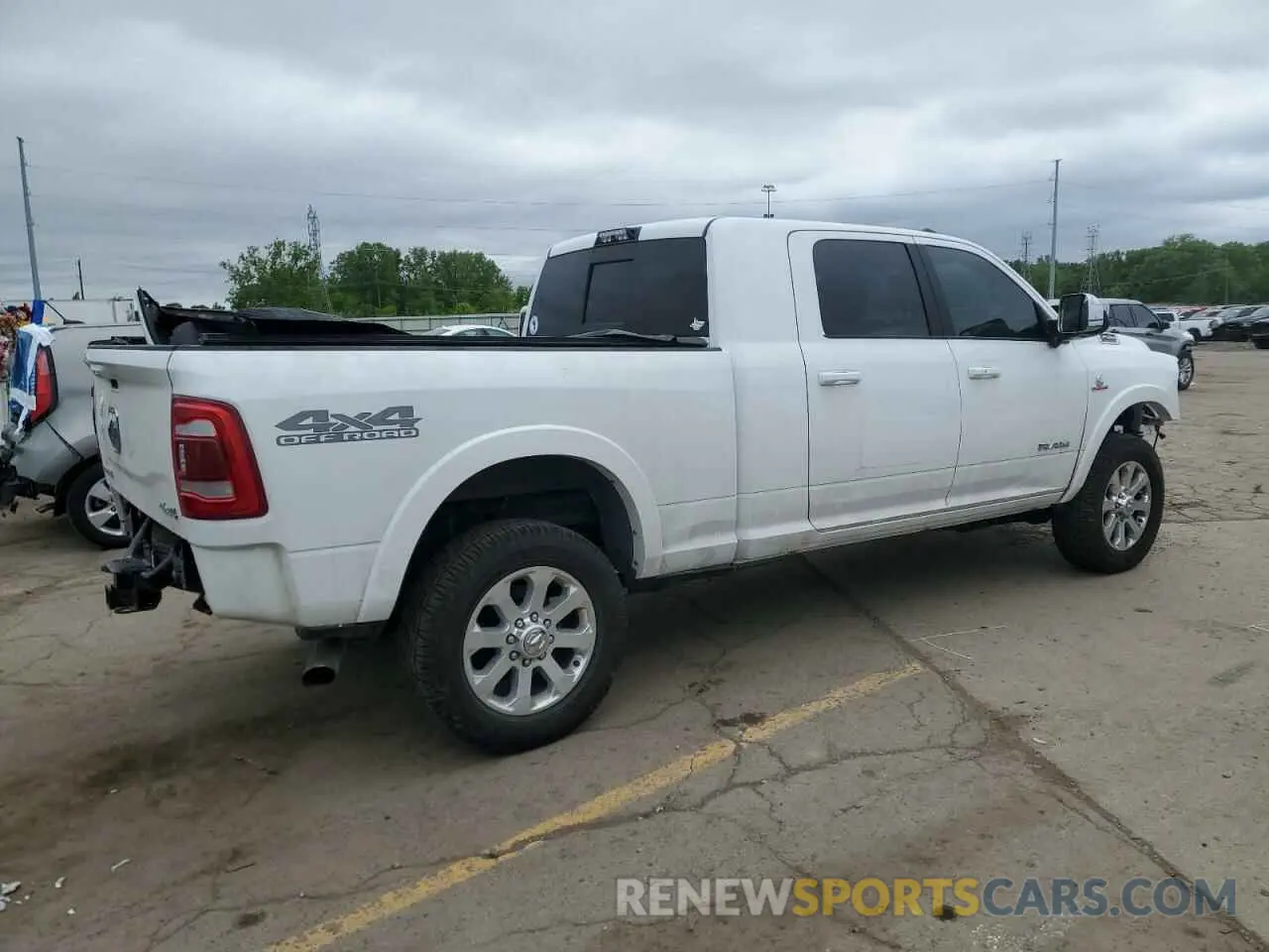 3 Photograph of a damaged car 3C6UR5NL7MG500589 RAM 2500 2021