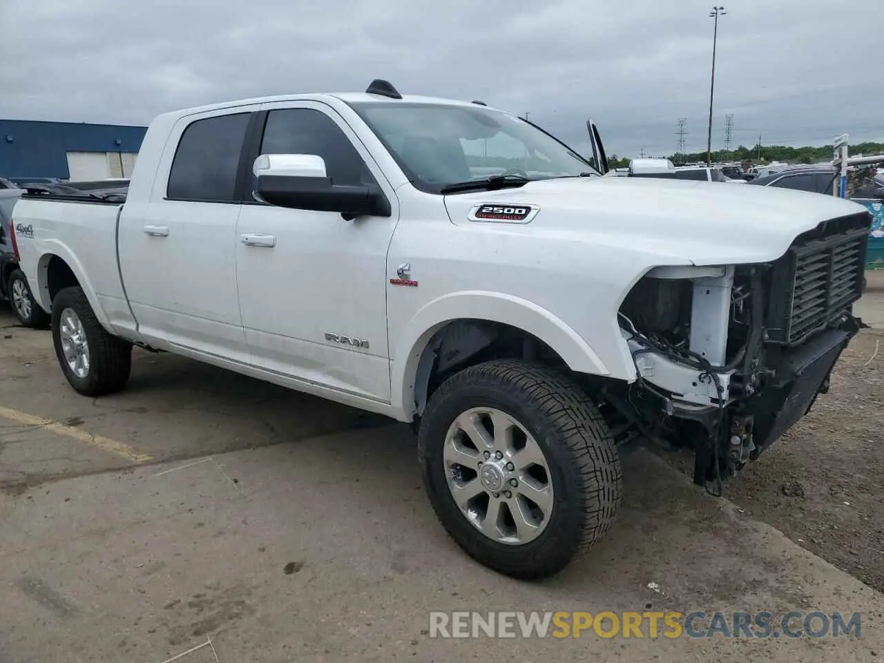 4 Photograph of a damaged car 3C6UR5NL7MG500589 RAM 2500 2021