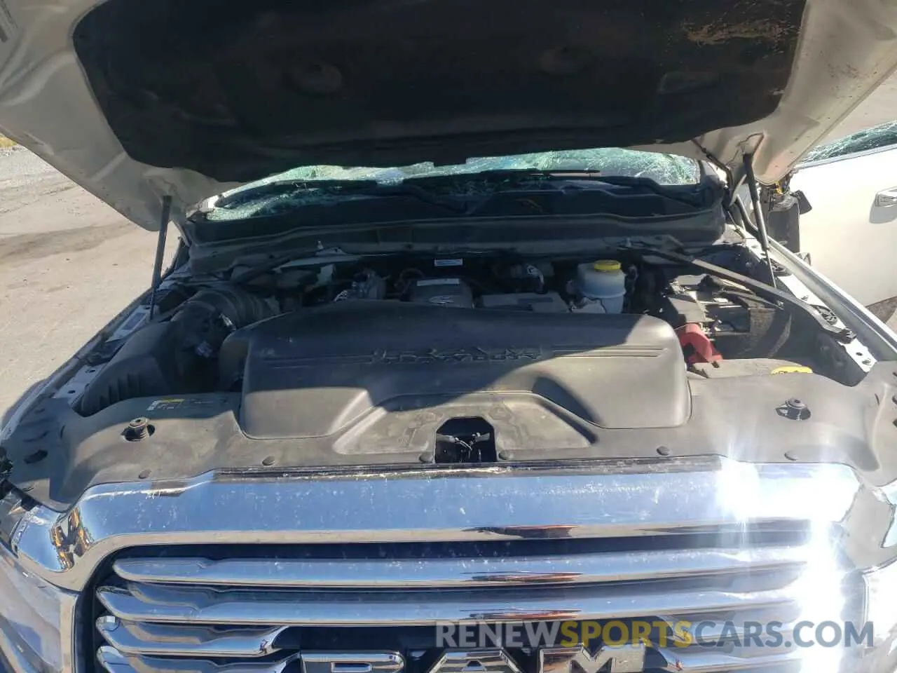 11 Photograph of a damaged car 3C6UR5PL3MG597335 RAM 2500 2021
