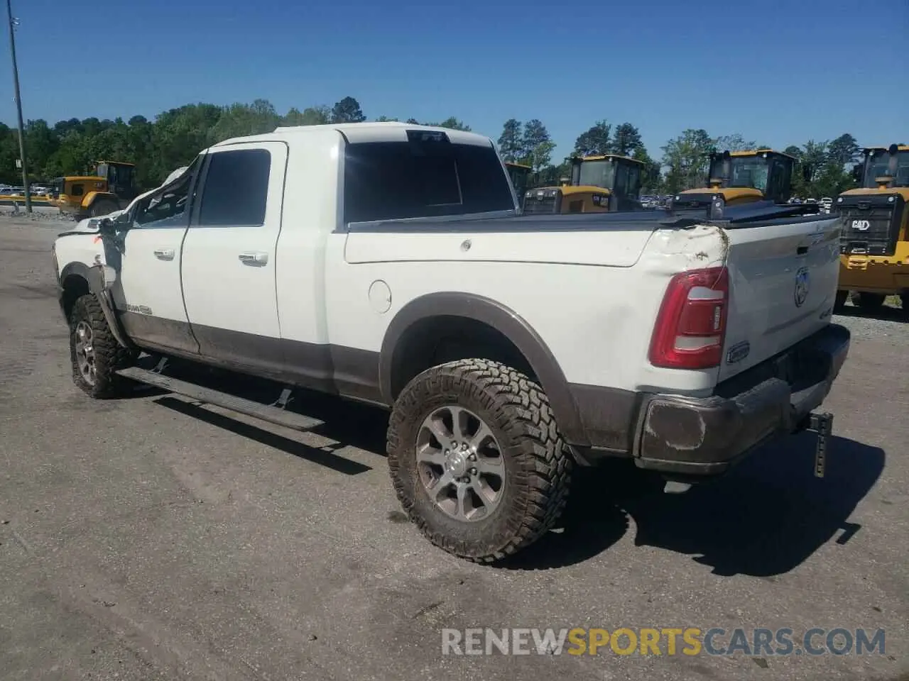 2 Photograph of a damaged car 3C6UR5PL3MG597335 RAM 2500 2021