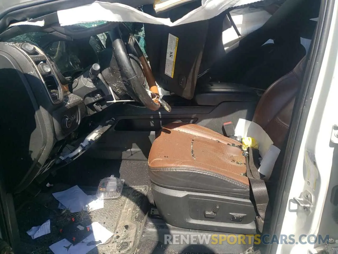7 Photograph of a damaged car 3C6UR5PL3MG597335 RAM 2500 2021