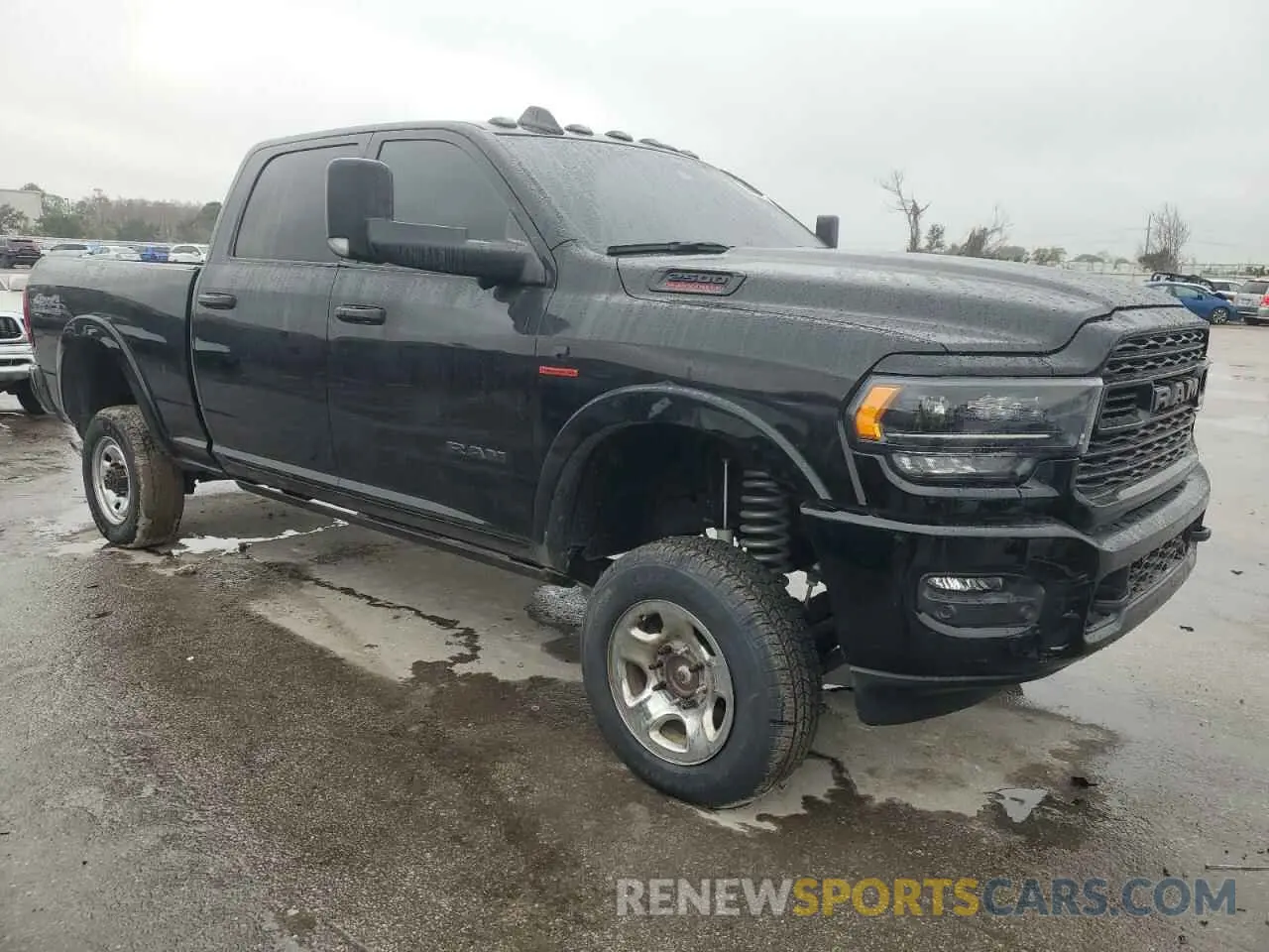 4 Photograph of a damaged car 3C6UR5SL1MG678633 RAM 2500 2021