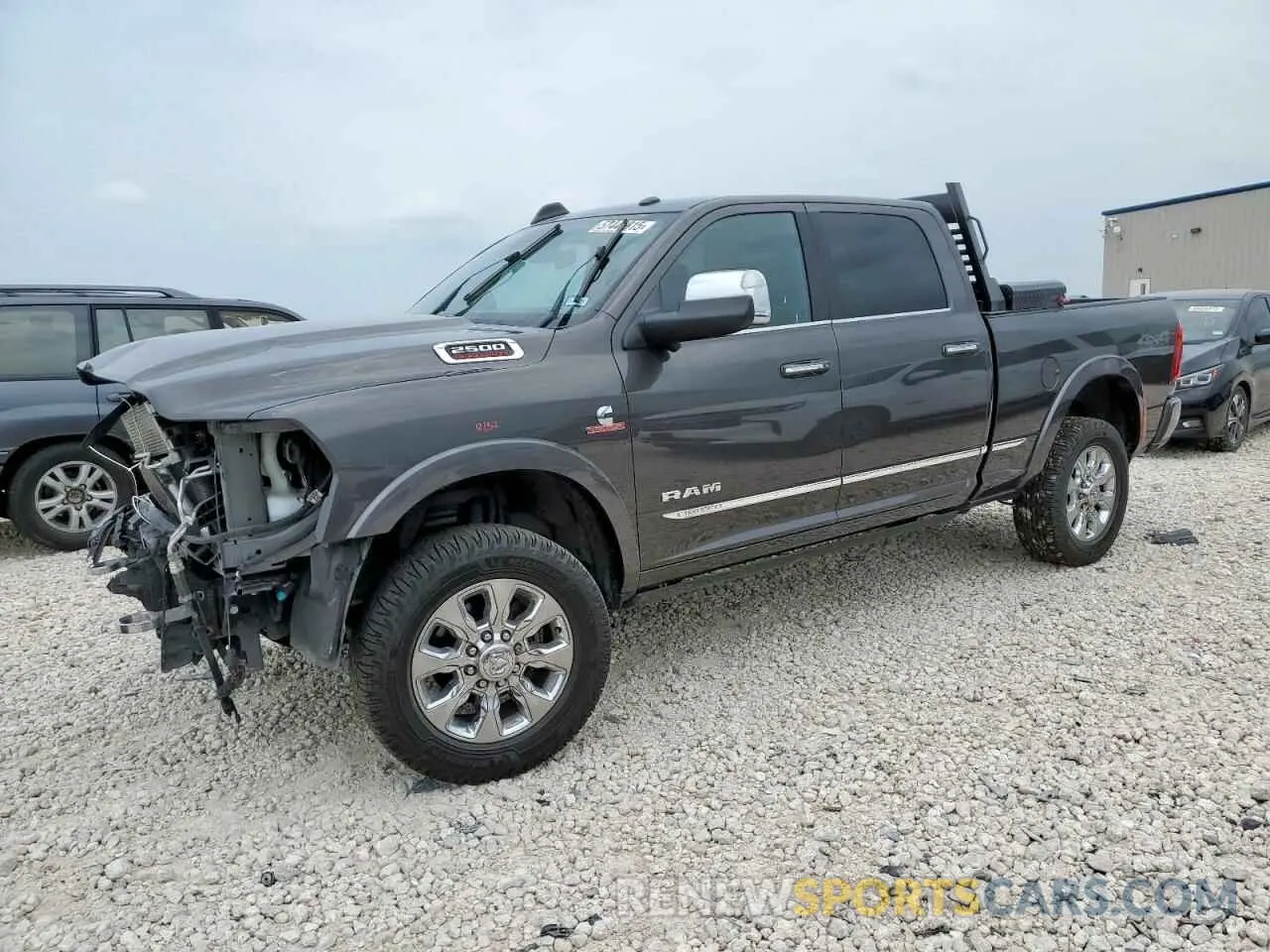 1 Photograph of a damaged car 3C6UR5SL3MG674681 RAM 2500 2021