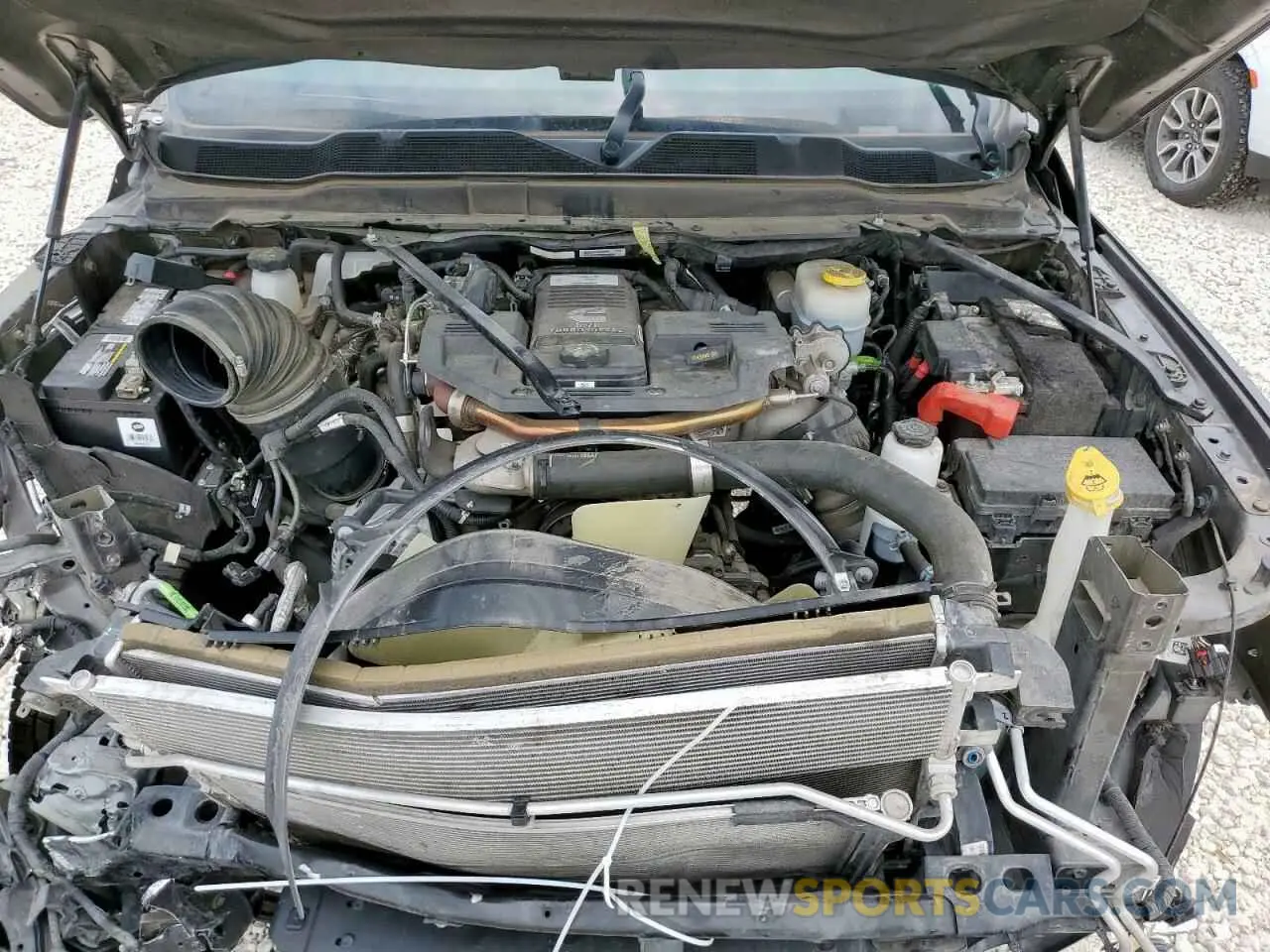 11 Photograph of a damaged car 3C6UR5SL3MG674681 RAM 2500 2021
