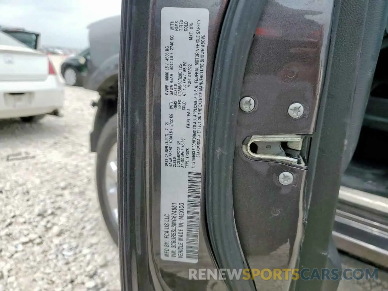 12 Photograph of a damaged car 3C6UR5SL3MG674681 RAM 2500 2021
