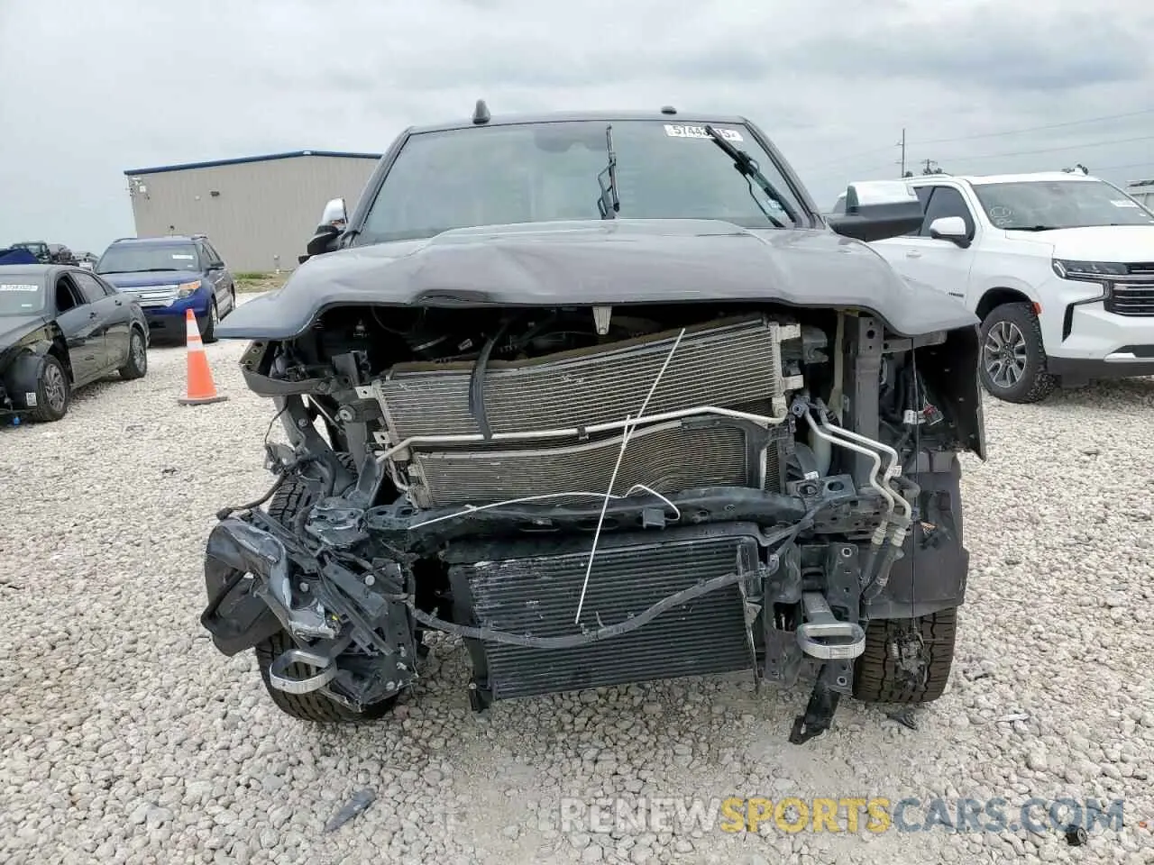 5 Photograph of a damaged car 3C6UR5SL3MG674681 RAM 2500 2021