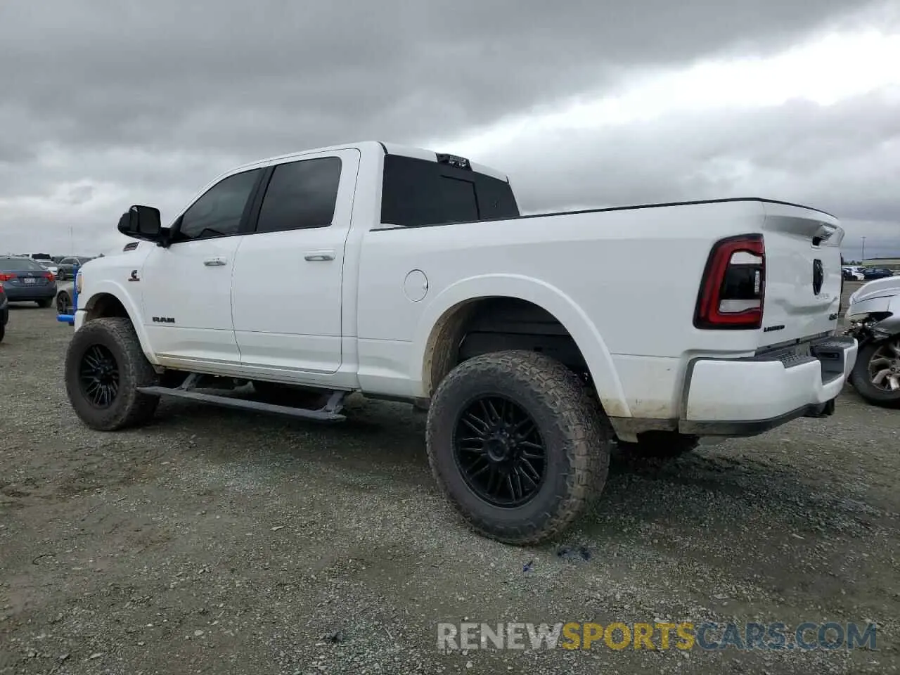 2 Photograph of a damaged car 3C6UR5SL5MG653685 RAM 2500 2021