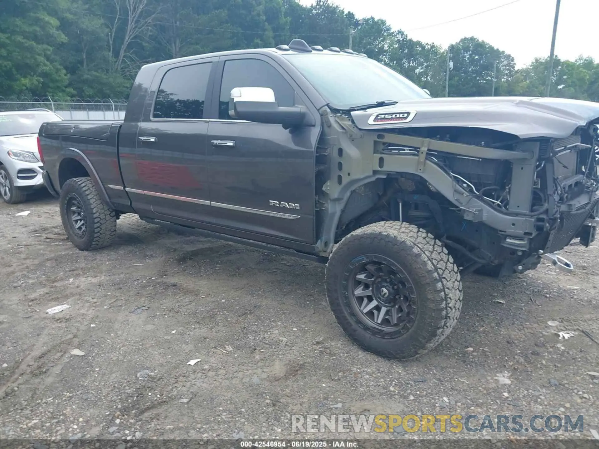 1 Photograph of a damaged car 3C6UR5TL3MG551333 RAM 2500 2021
