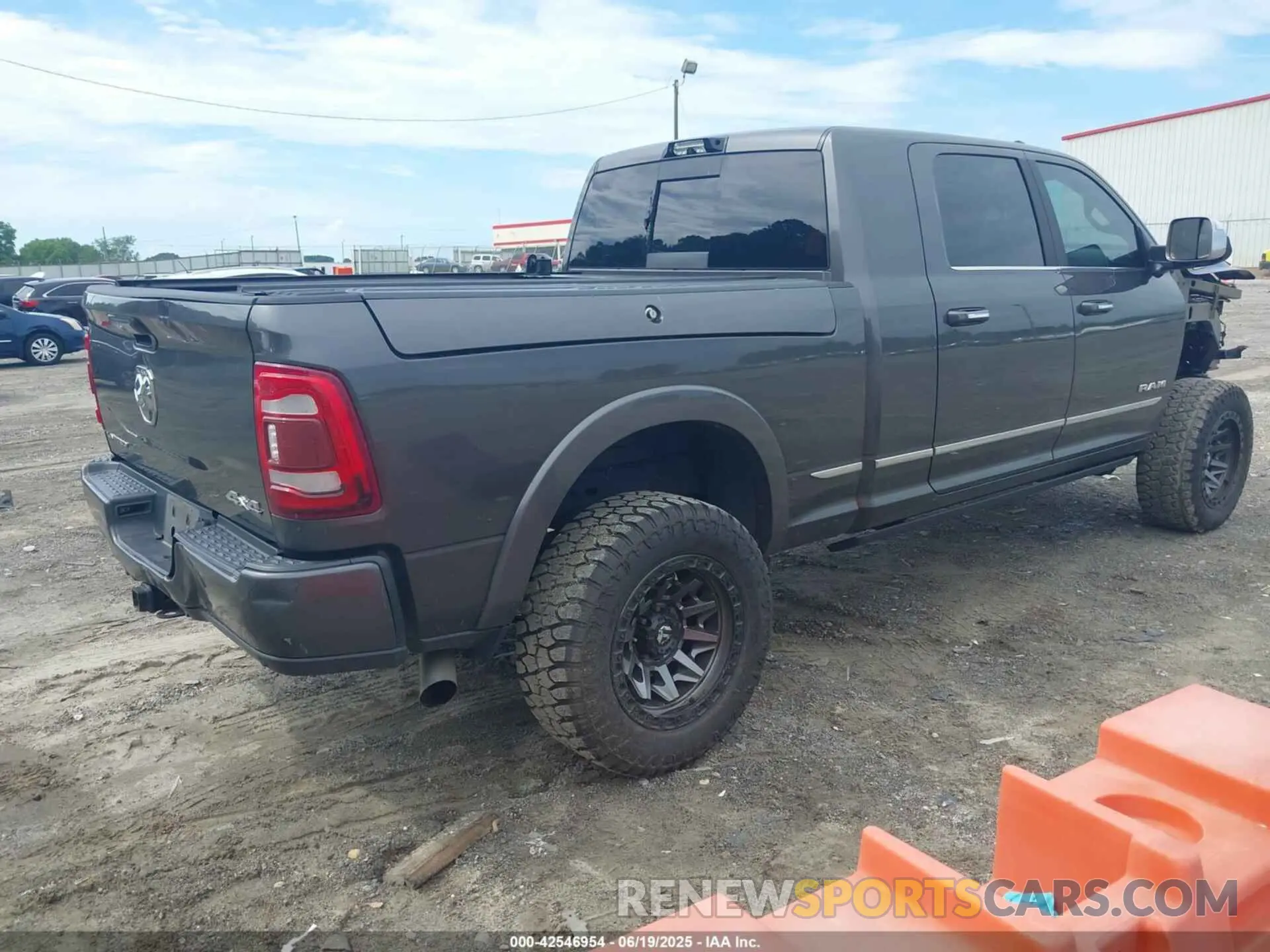 4 Photograph of a damaged car 3C6UR5TL3MG551333 RAM 2500 2021