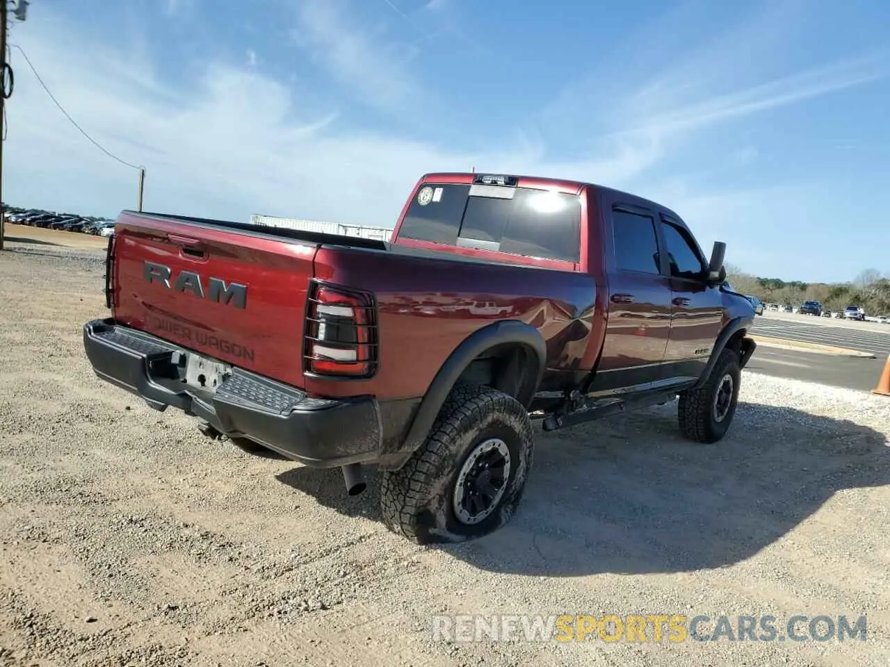 3 Photograph of a damaged car 3C6TR5EJ2NG111256 RAM 2500 2022