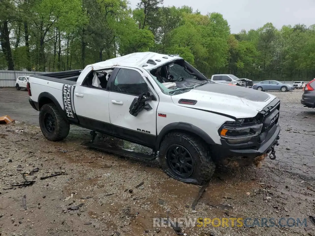4 Photograph of a damaged car 3C6TR5EJ9NG222841 RAM 2500 2022