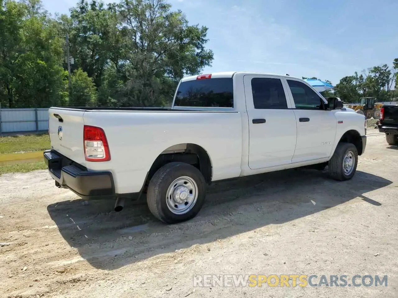 3 Photograph of a damaged car 3C6UR4CJ7NG356300 RAM 2500 2022
