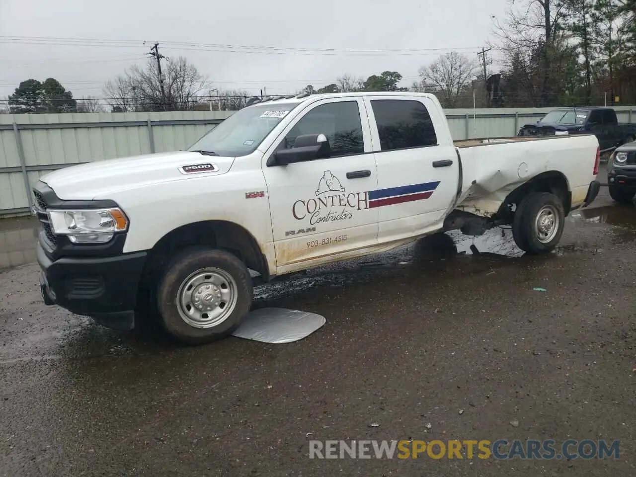 1 Photograph of a damaged car 3C6UR4HJ7NG280196 RAM 2500 2022