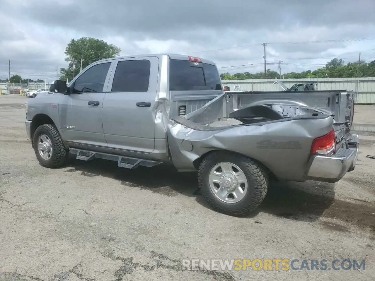 2 Photograph of a damaged car 3C6UR5CJ2NG108459 RAM 2500 2022