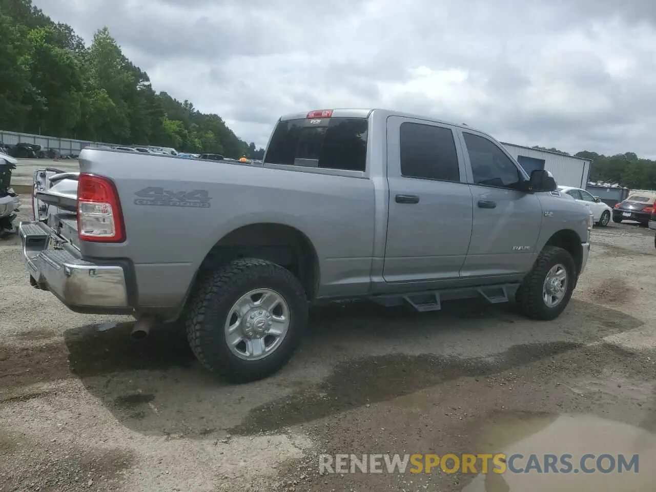 3 Photograph of a damaged car 3C6UR5CJ2NG108459 RAM 2500 2022