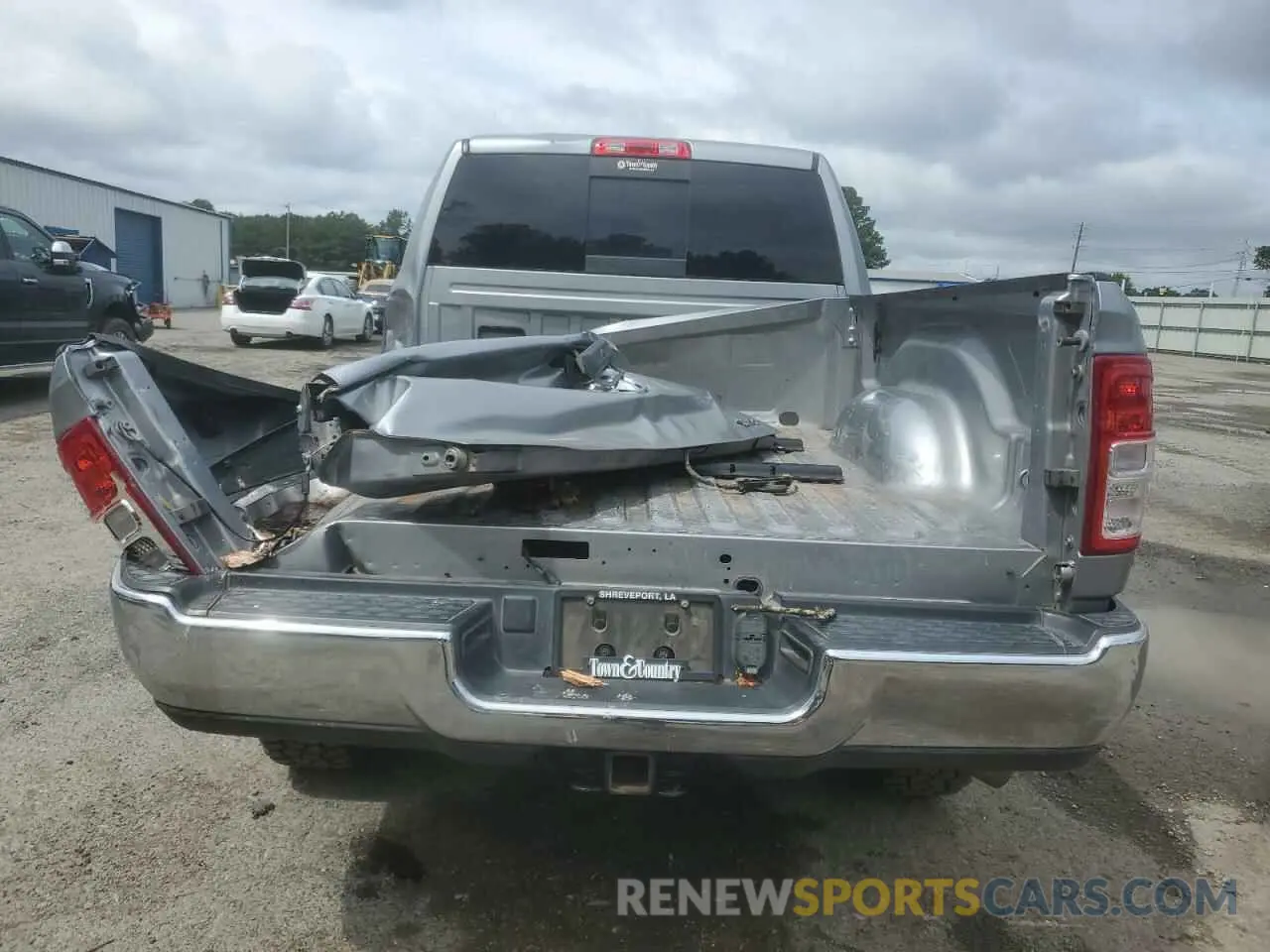 6 Photograph of a damaged car 3C6UR5CJ2NG108459 RAM 2500 2022