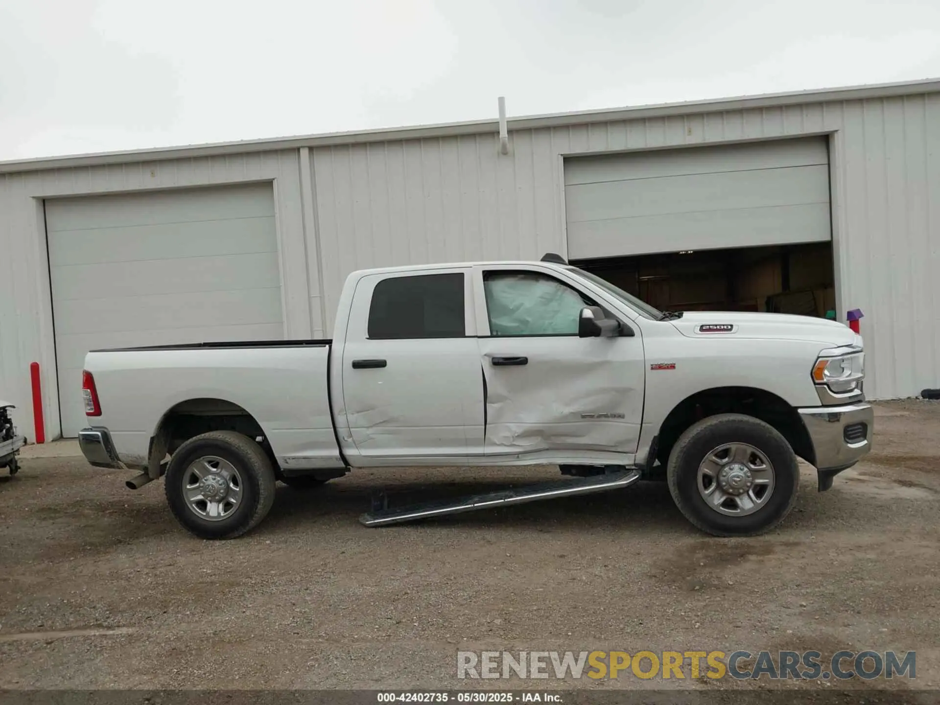 13 Photograph of a damaged car 3C6UR5CJ2NG150131 RAM 2500 2022