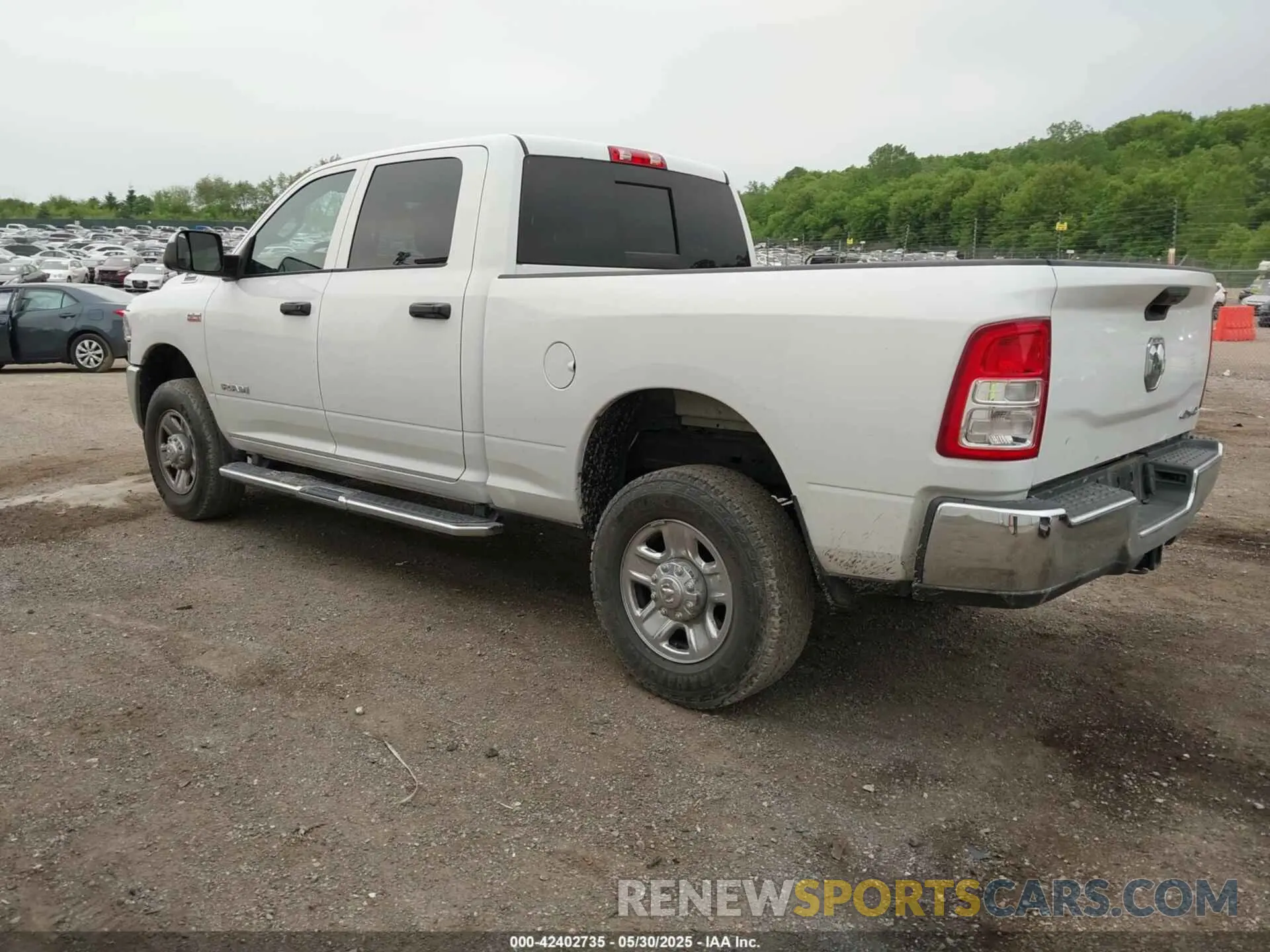 3 Photograph of a damaged car 3C6UR5CJ2NG150131 RAM 2500 2022