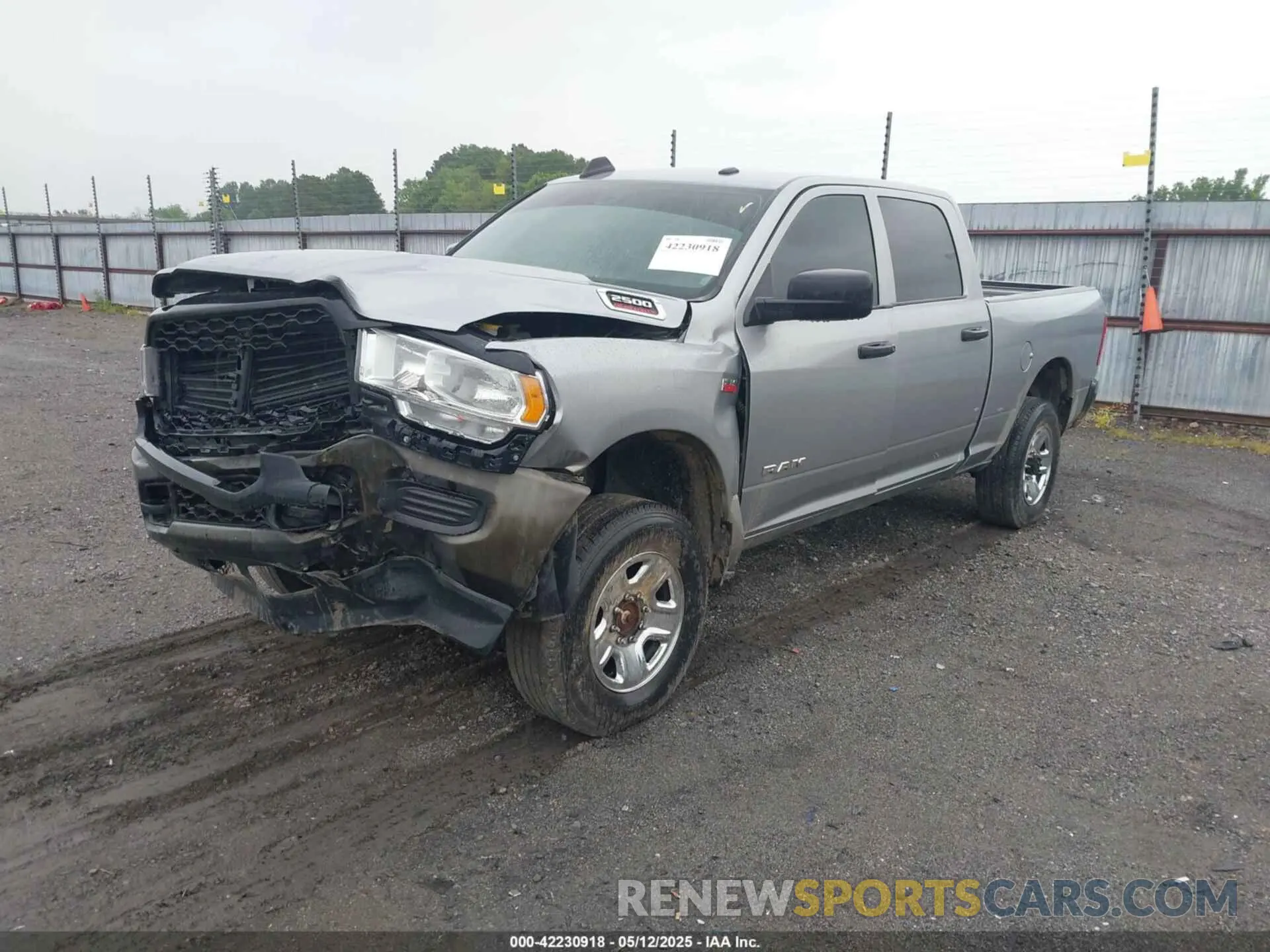 2 Photograph of a damaged car 3C6UR5CJ2NG253565 RAM 2500 2022