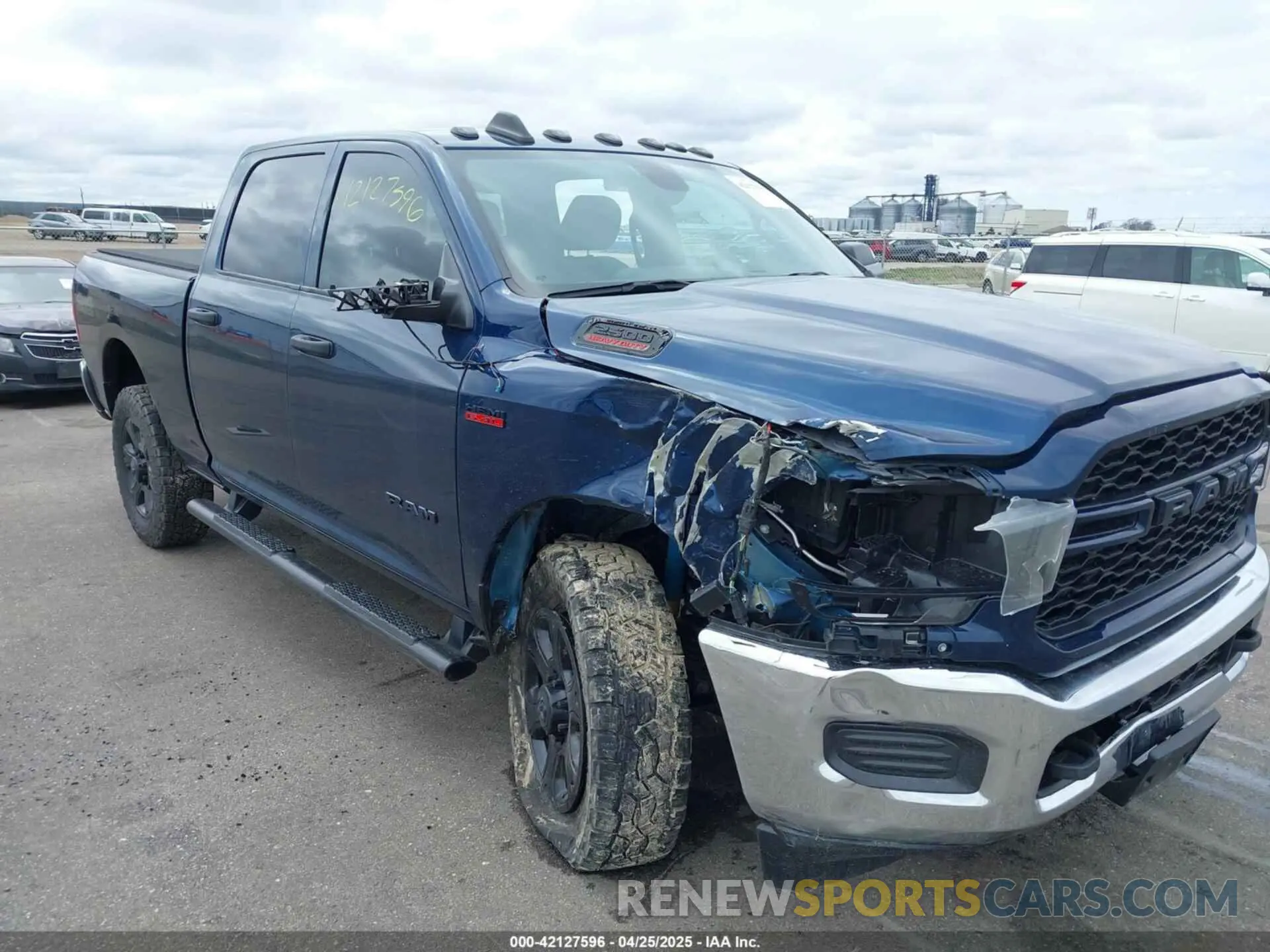 1 Photograph of a damaged car 3C6UR5CJ5NG131668 RAM 2500 2022