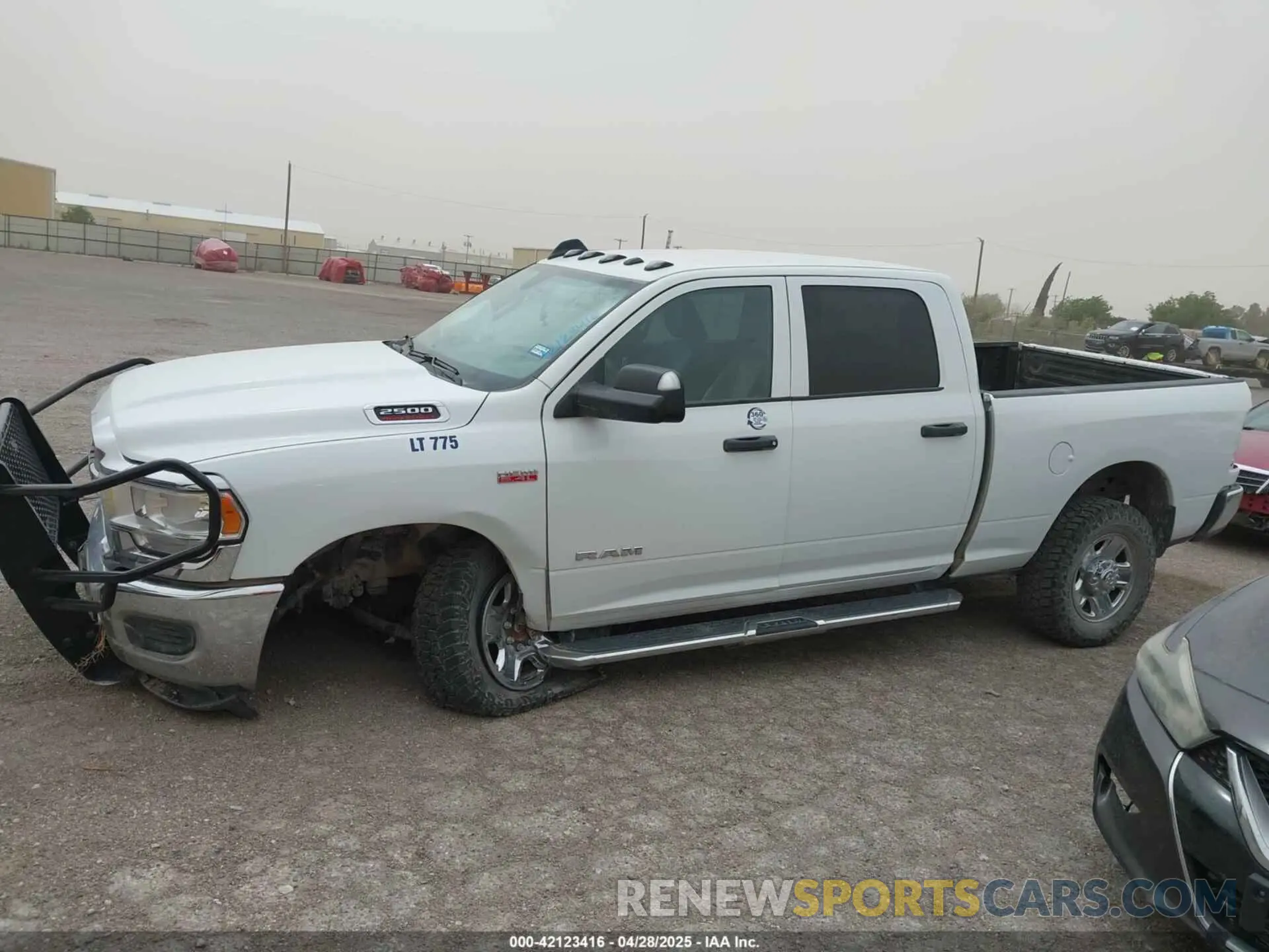 14 Photograph of a damaged car 3C6UR5CJ5NG366524 RAM 2500 2022