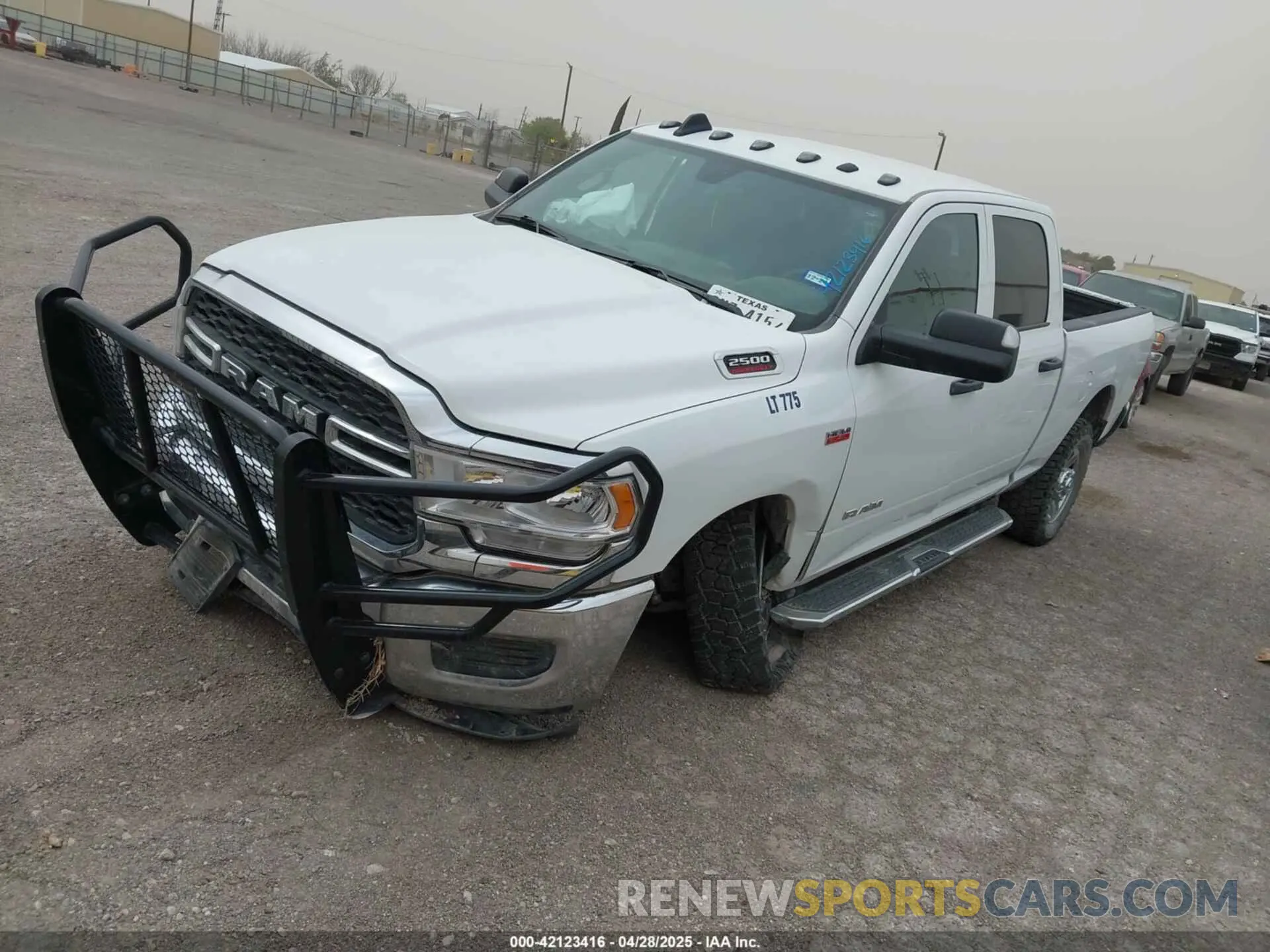 2 Photograph of a damaged car 3C6UR5CJ5NG366524 RAM 2500 2022
