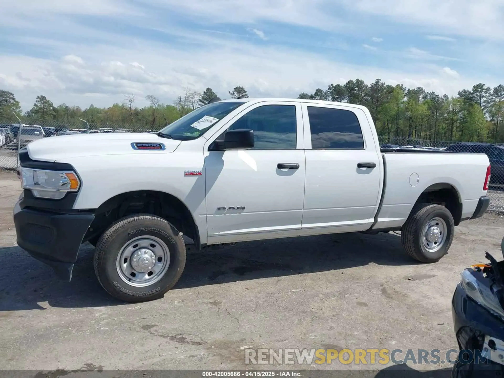 14 Photograph of a damaged car 3C6UR5CJ6NG203221 RAM 2500 2022
