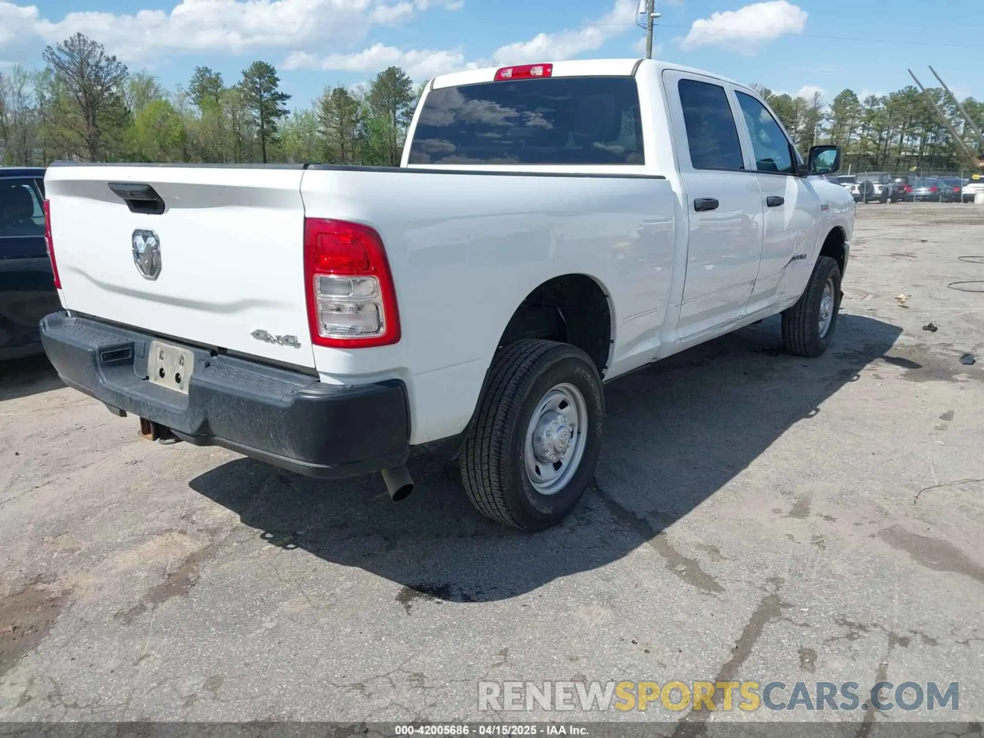 4 Photograph of a damaged car 3C6UR5CJ6NG203221 RAM 2500 2022