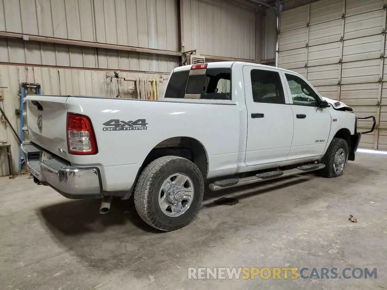 3 Photograph of a damaged car 3C6UR5CJ6NG373076 RAM 2500 2022