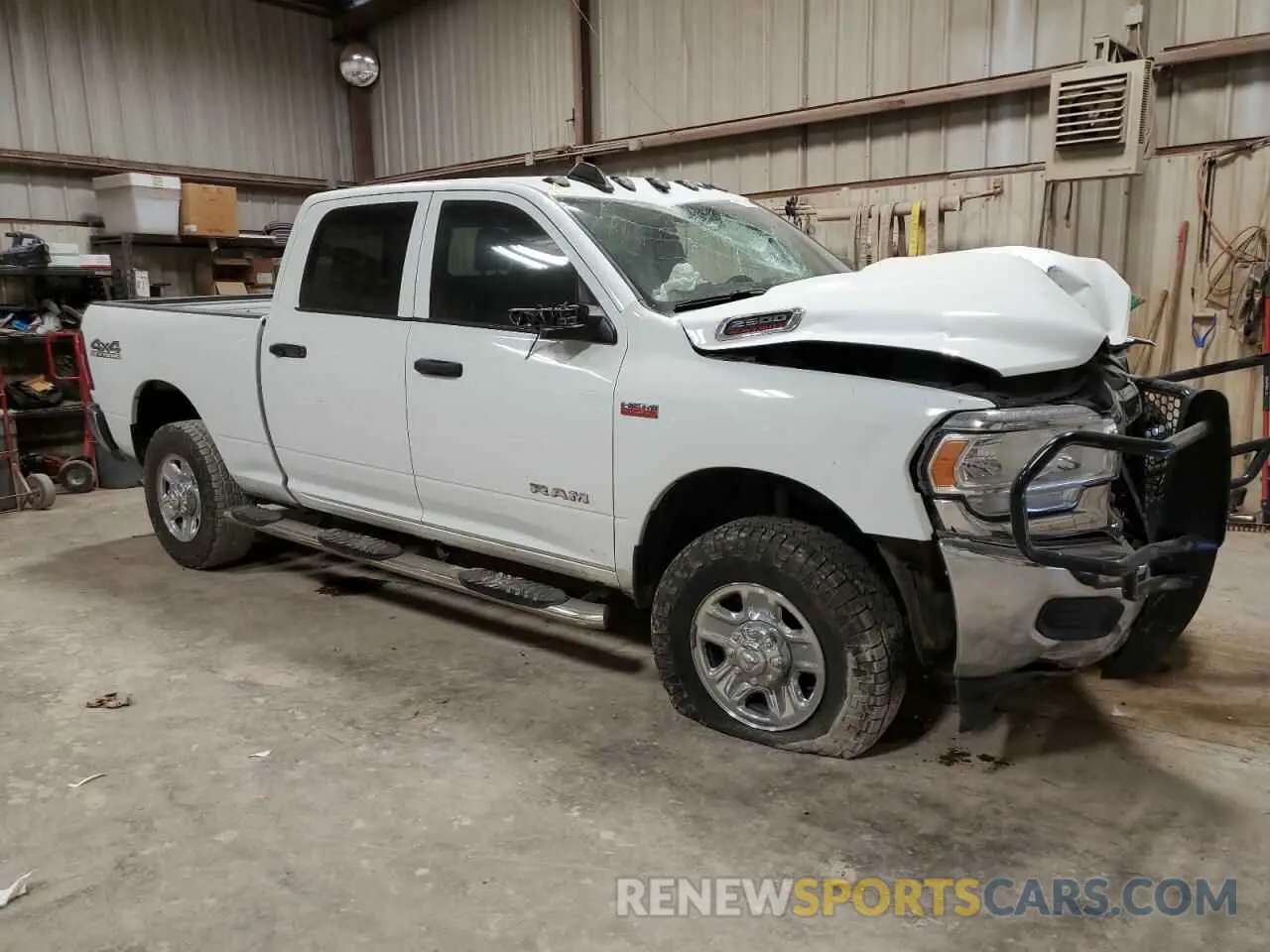 4 Photograph of a damaged car 3C6UR5CJ6NG373076 RAM 2500 2022
