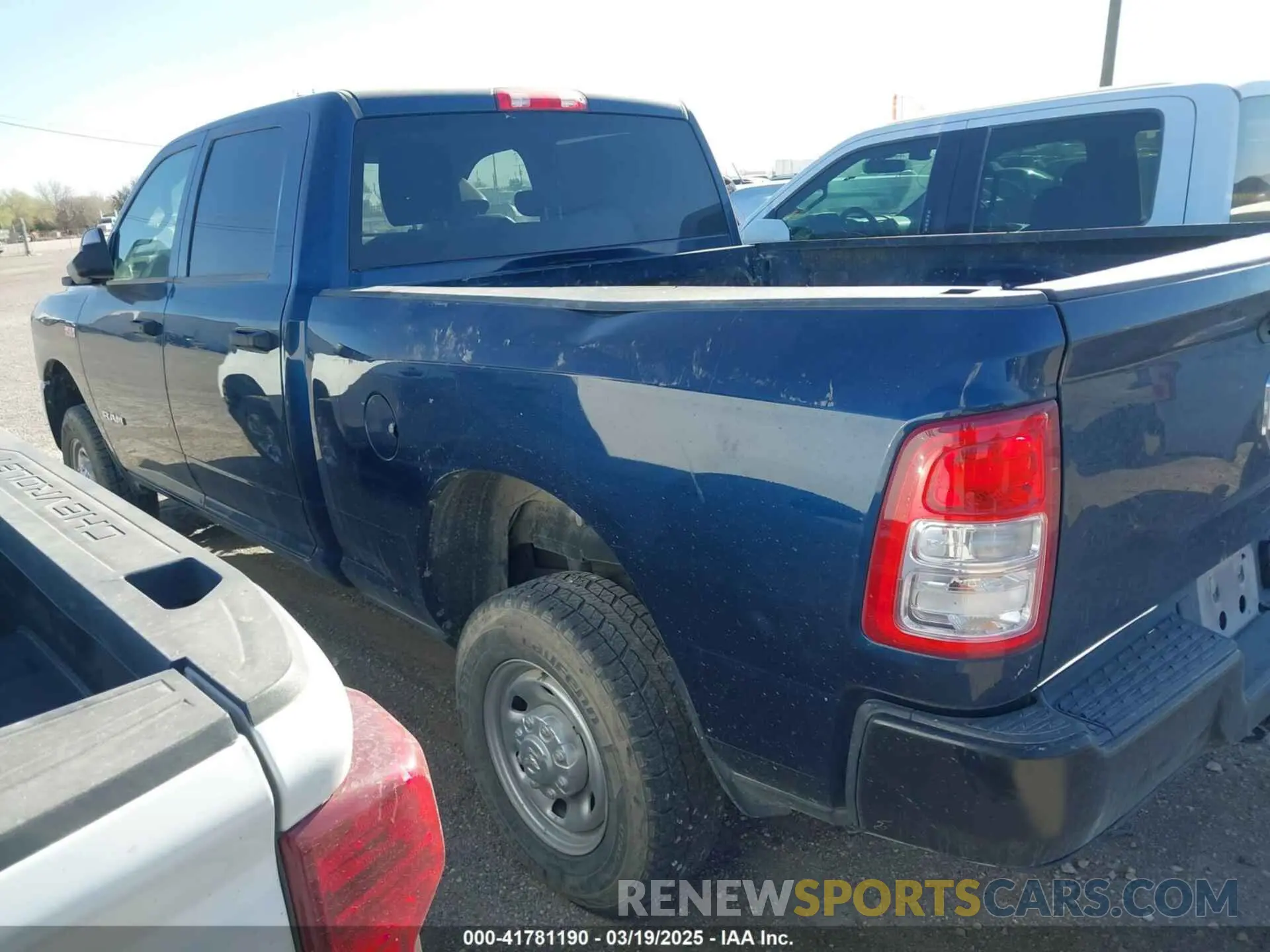 3 Photograph of a damaged car 3C6UR5CJ9NG370754 RAM 2500 2022