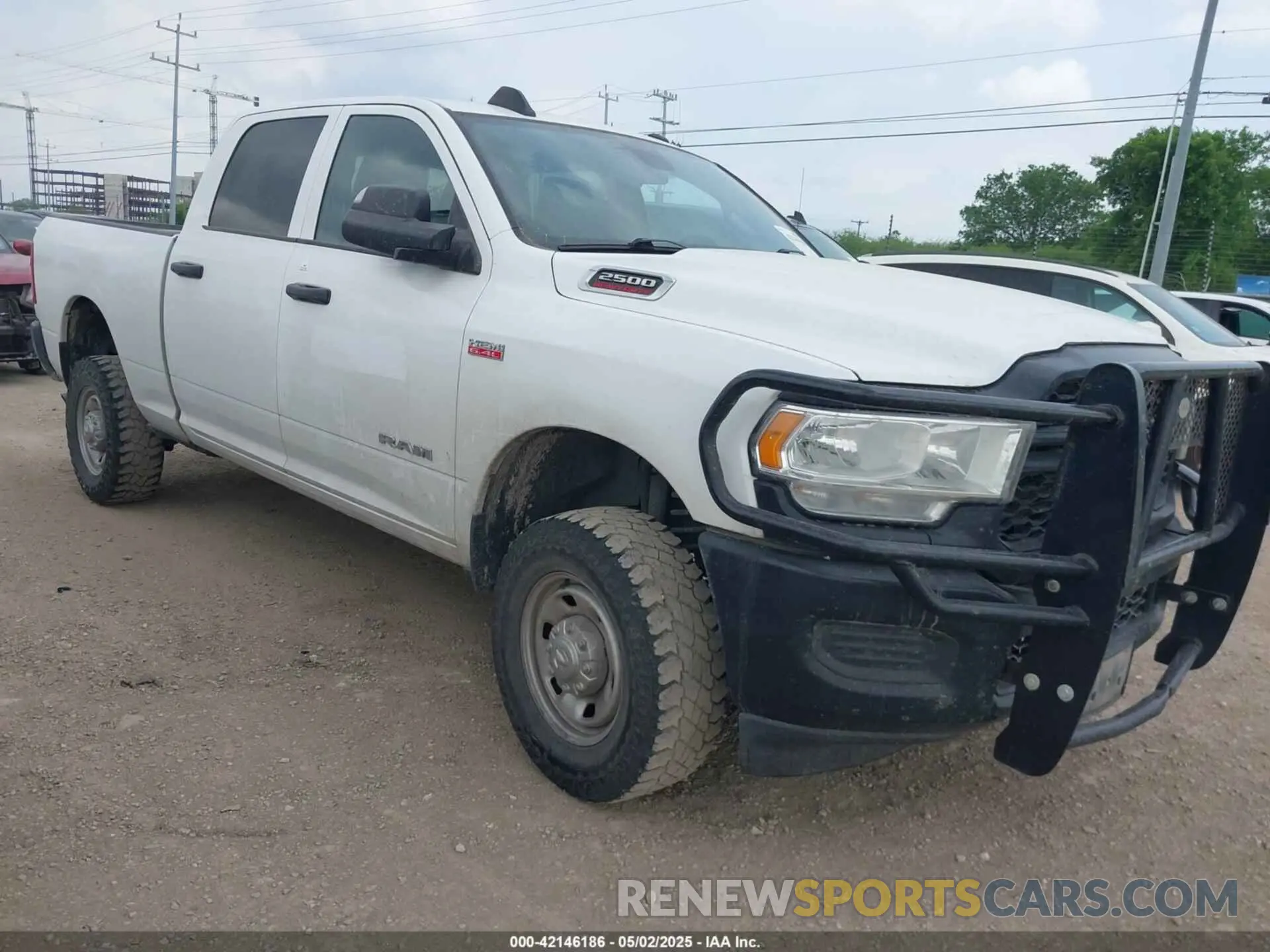 1 Photograph of a damaged car 3C6UR5CJXNG204016 RAM 2500 2022