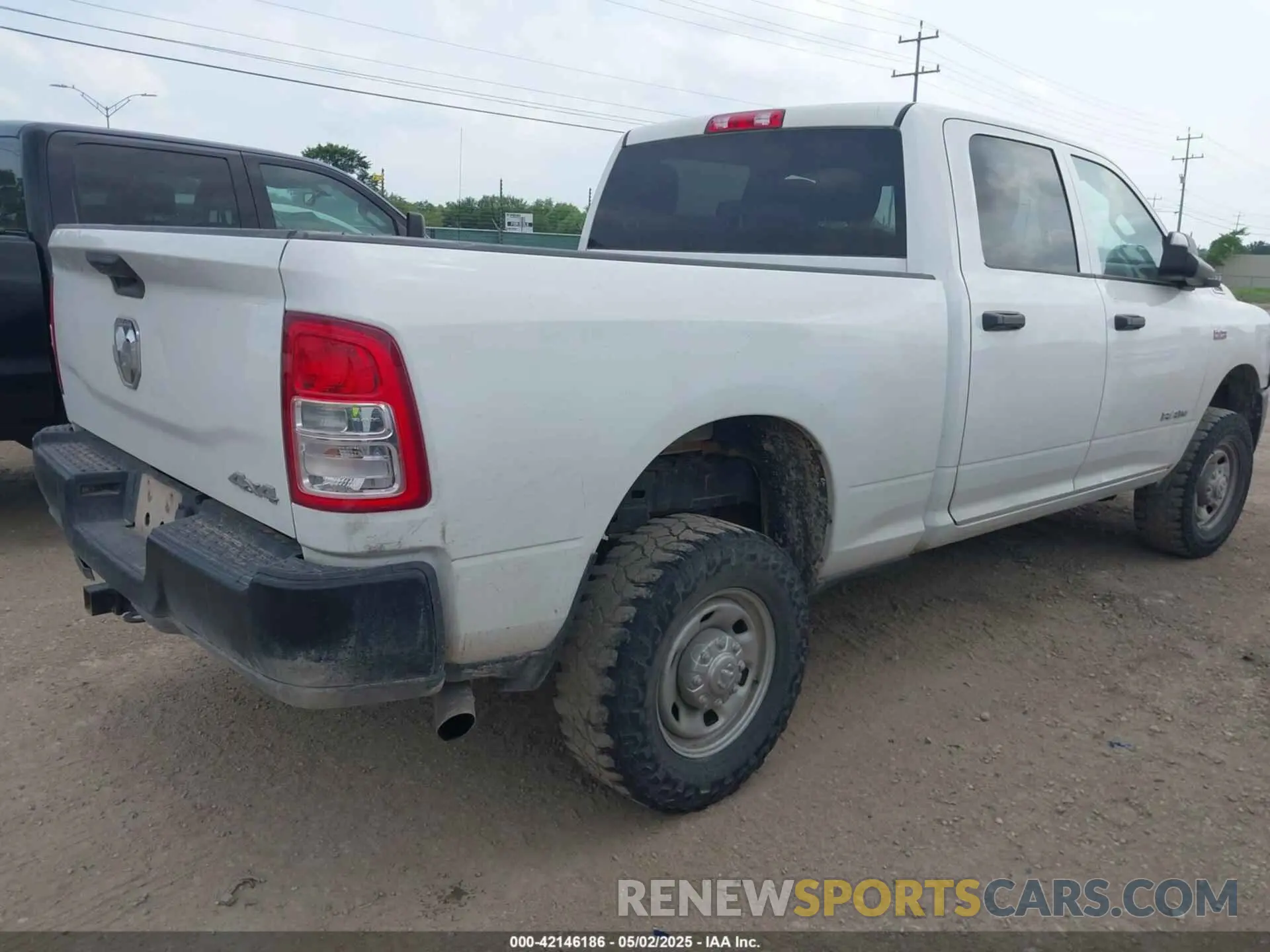 4 Photograph of a damaged car 3C6UR5CJXNG204016 RAM 2500 2022