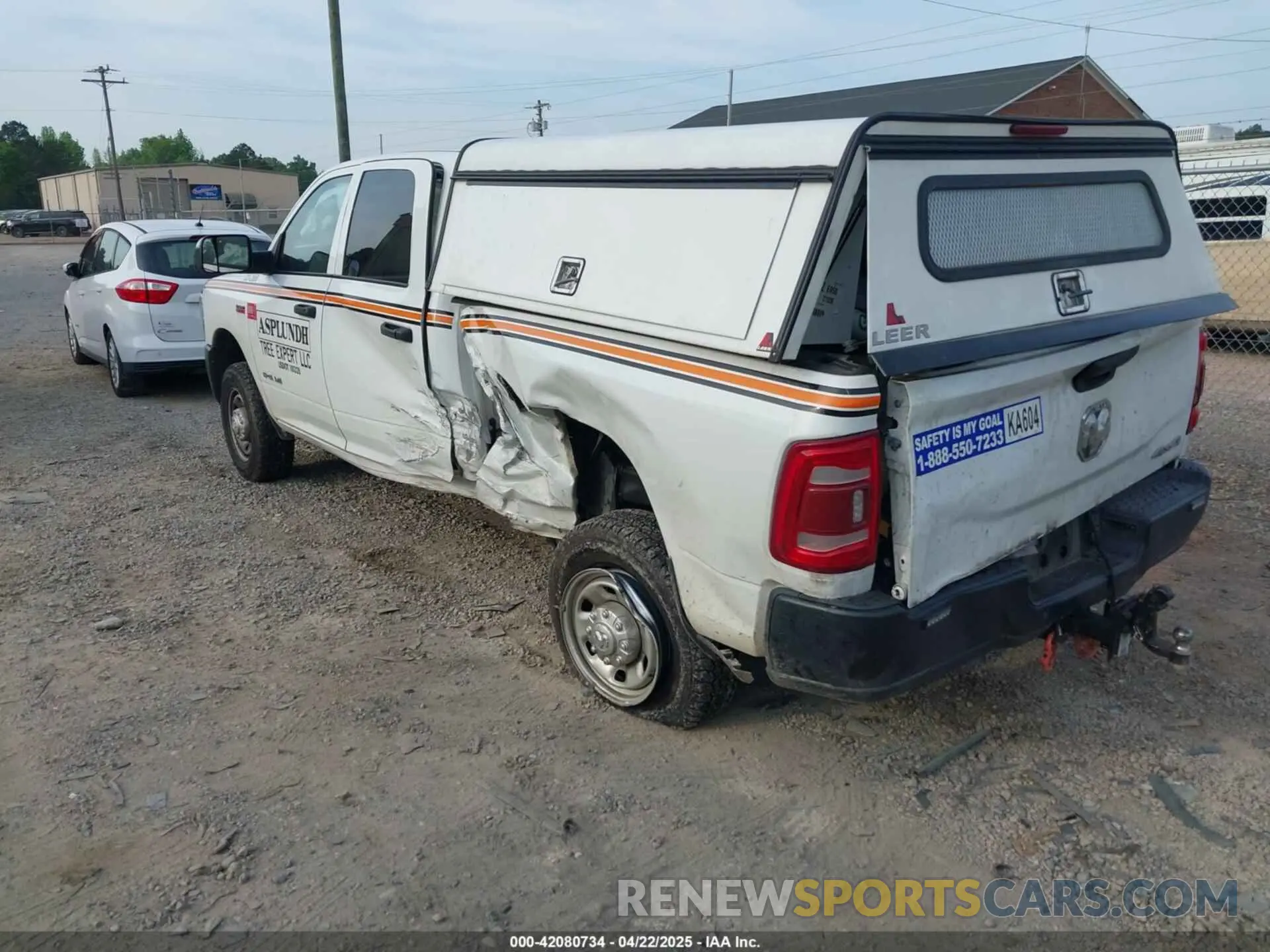 3 Photograph of a damaged car 3C6UR5CJXNG271926 RAM 2500 2022