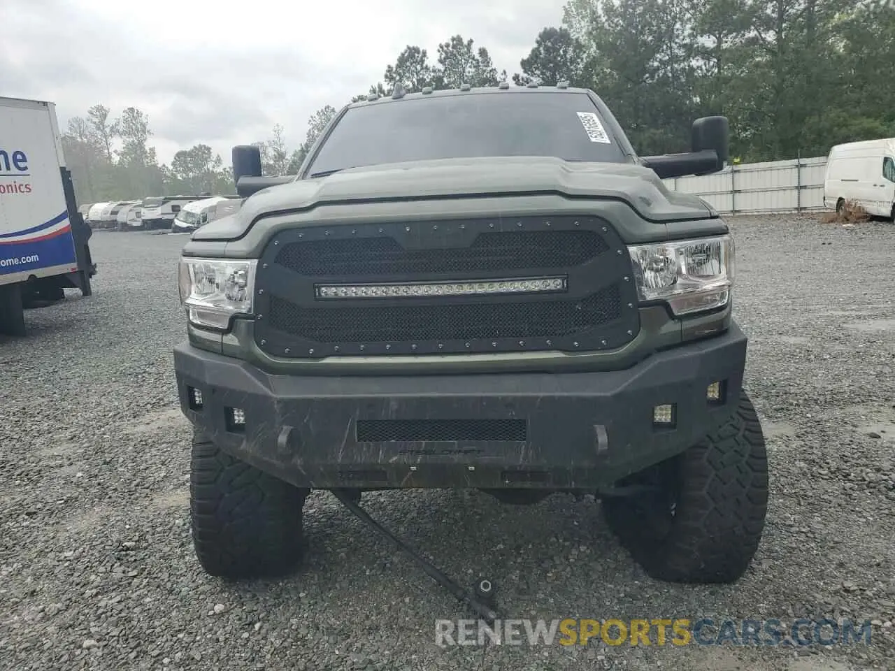 5 Photograph of a damaged car 3C6UR5CL0NG250407 RAM 2500 2022