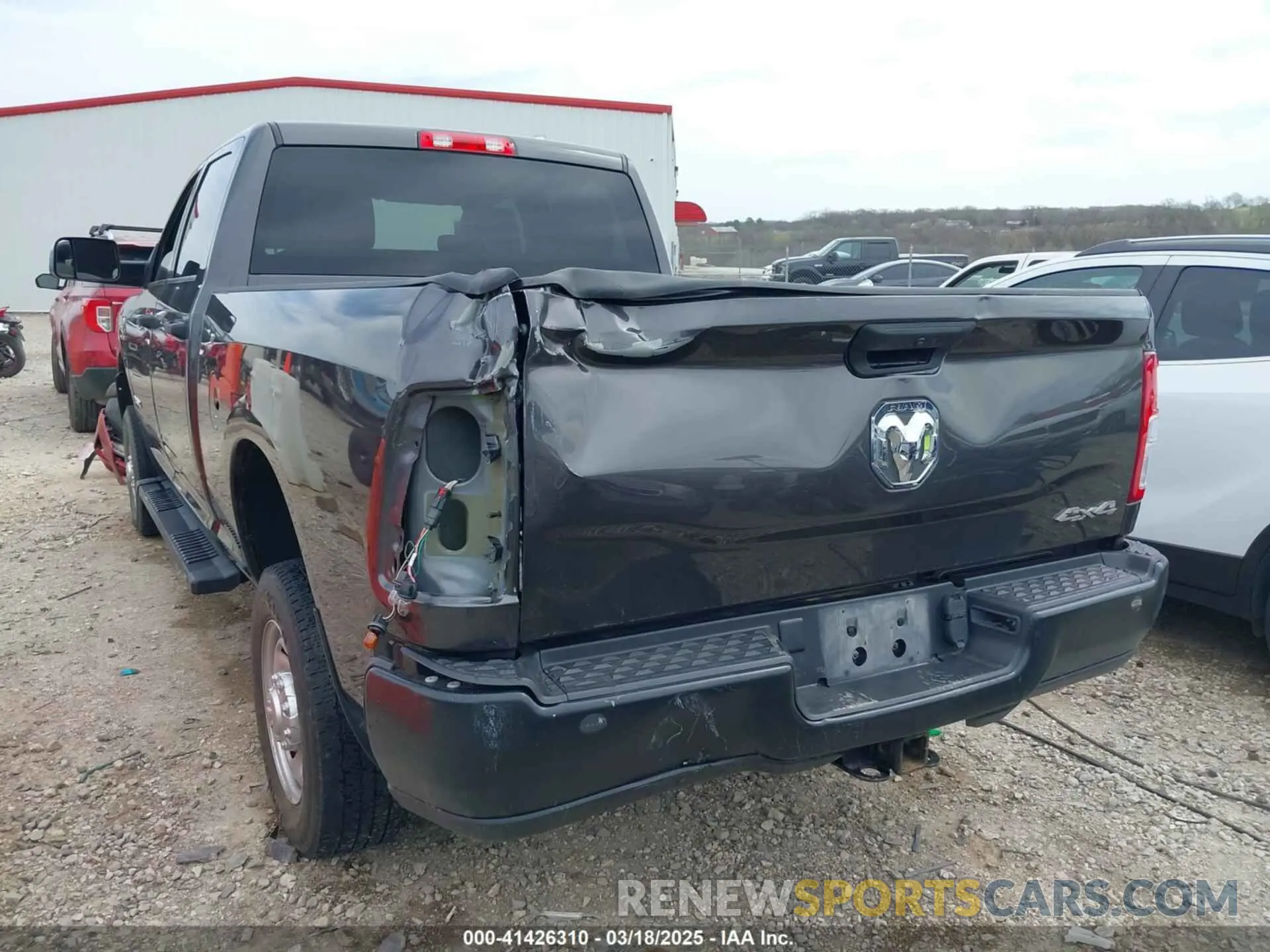 3 Photograph of a damaged car 3C6UR5CL6NG144527 RAM 2500 2022